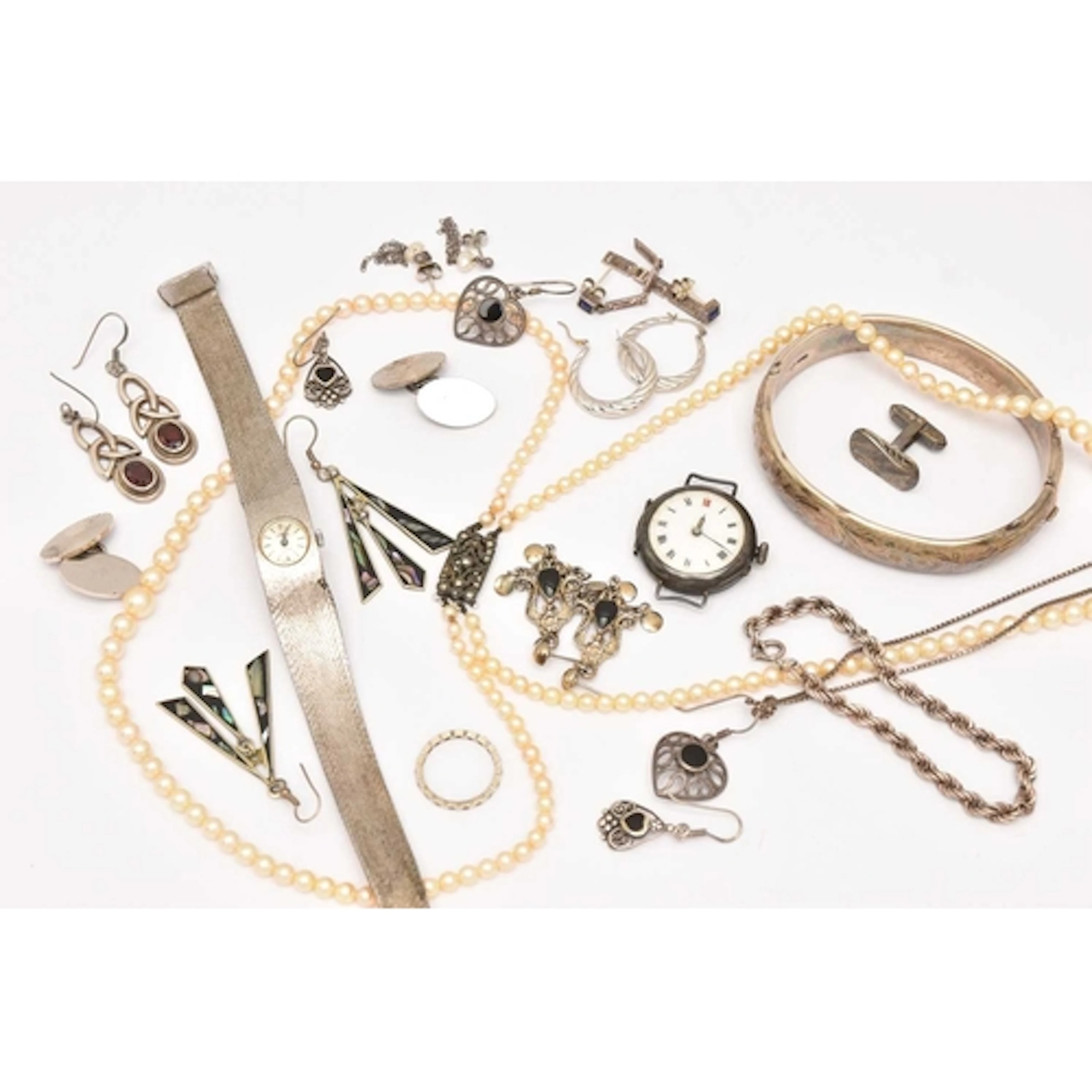 AN ASSORTMENT OF SILVER AND WHITE METAL, to include a silver...