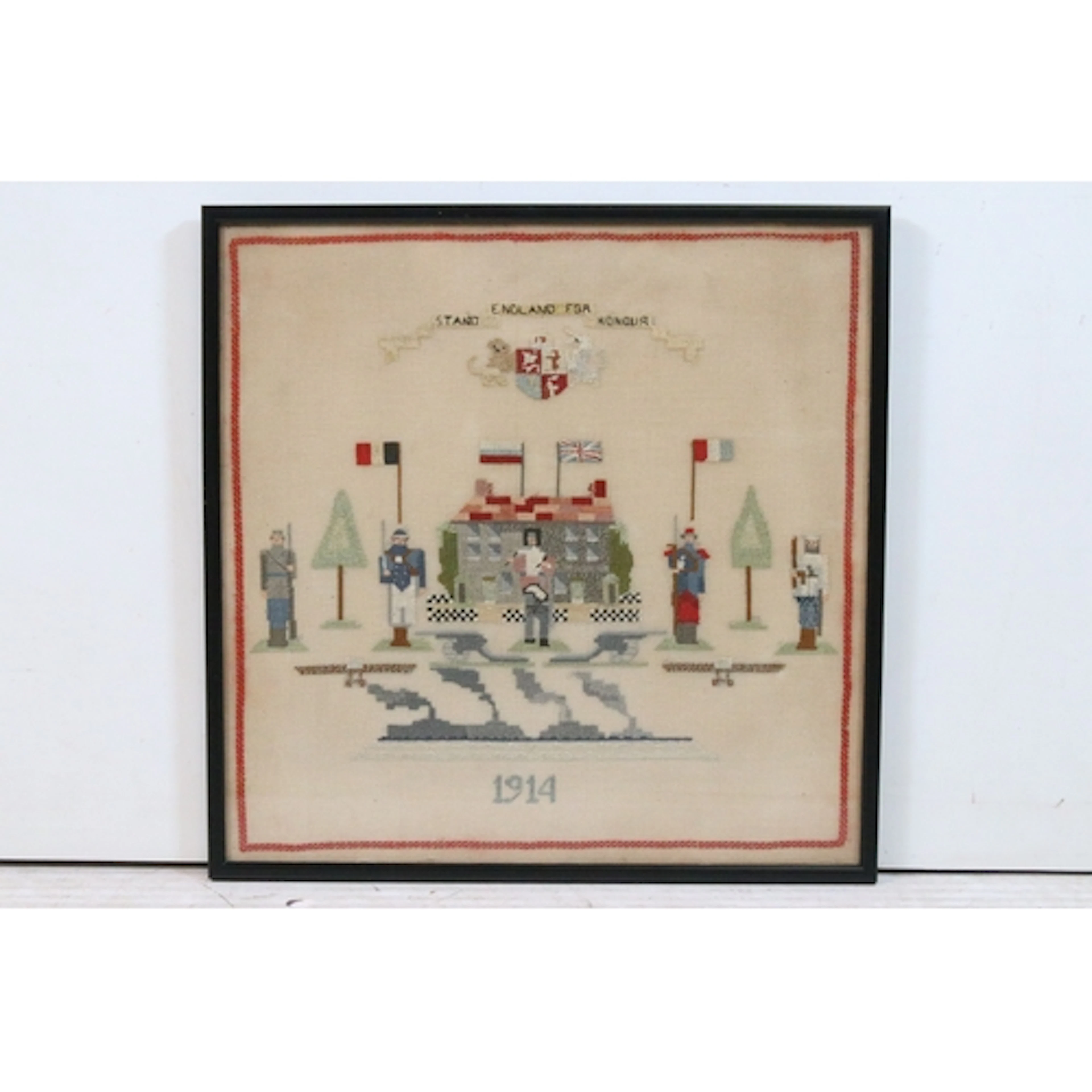 Early 20th century needlework sampler depicting a military s...
