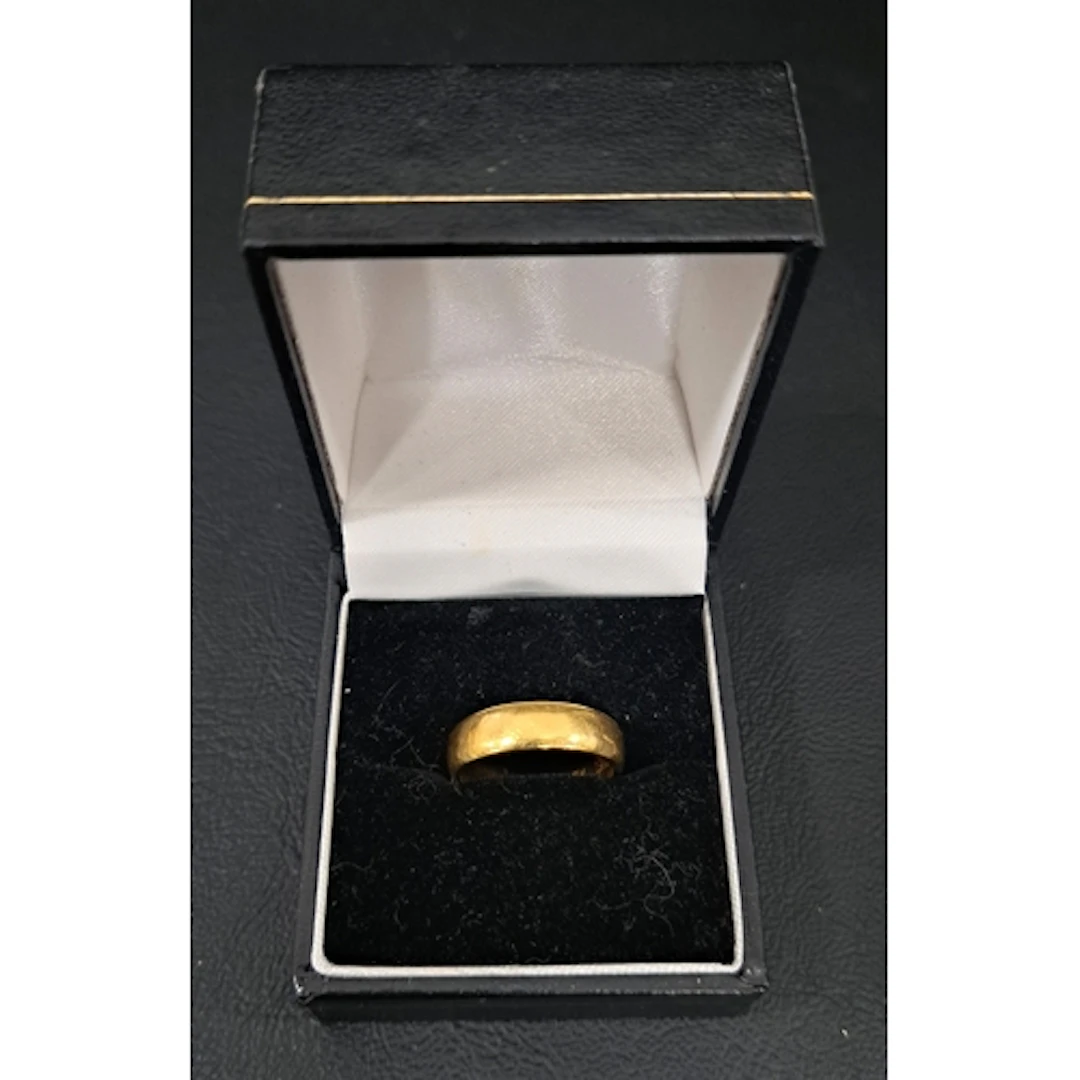 EIGHTEEN CARAT GOLD BAND ring size J and approximately 4.8 g...
