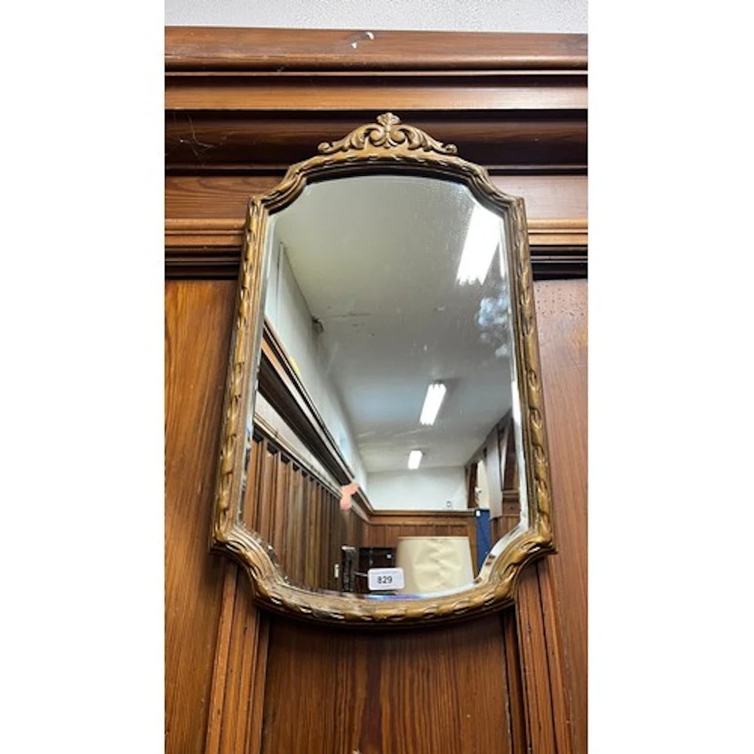 Shield shaped wall mirror, 69cm tall.