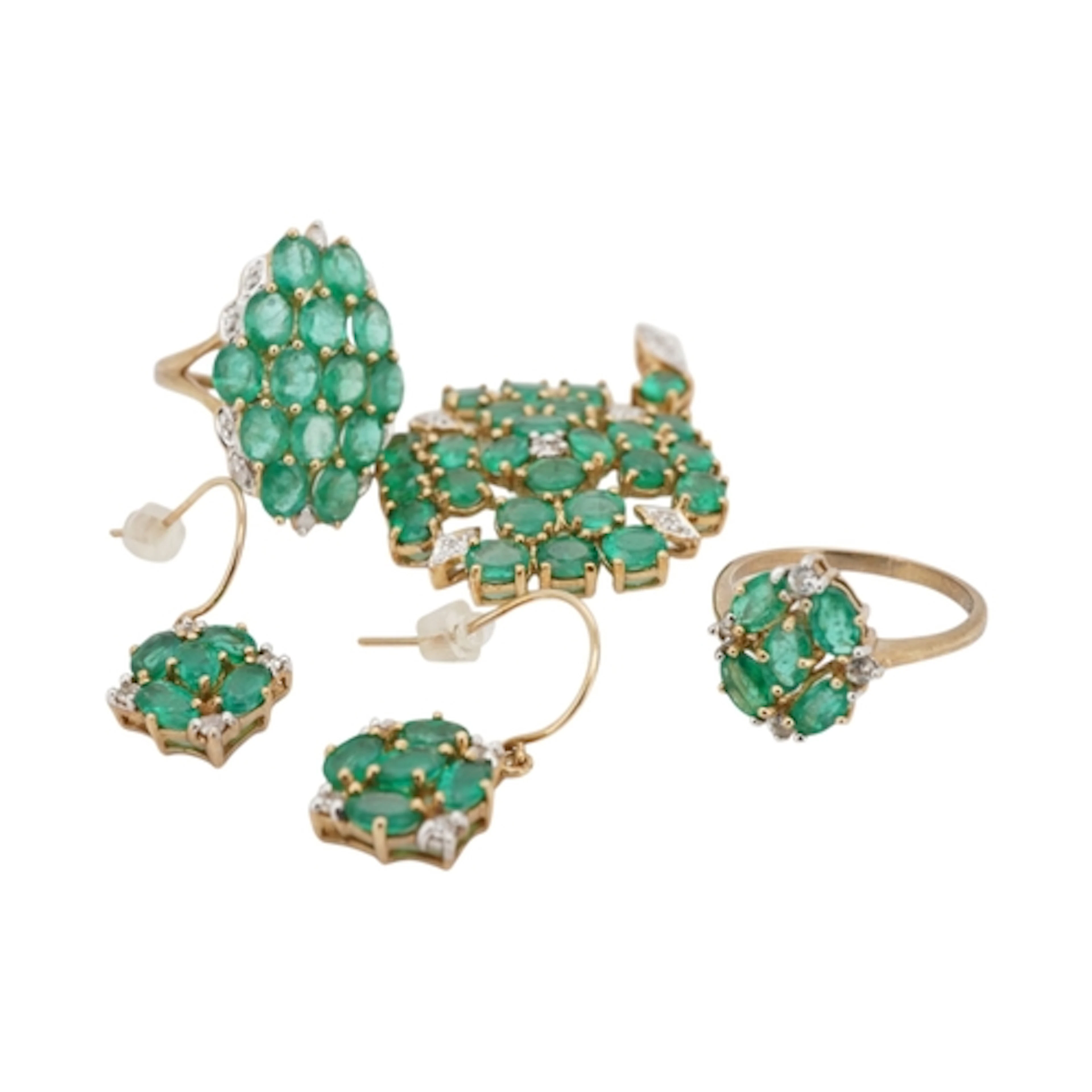 An emerald parure, comprising: a pendant, two rings, and a p...