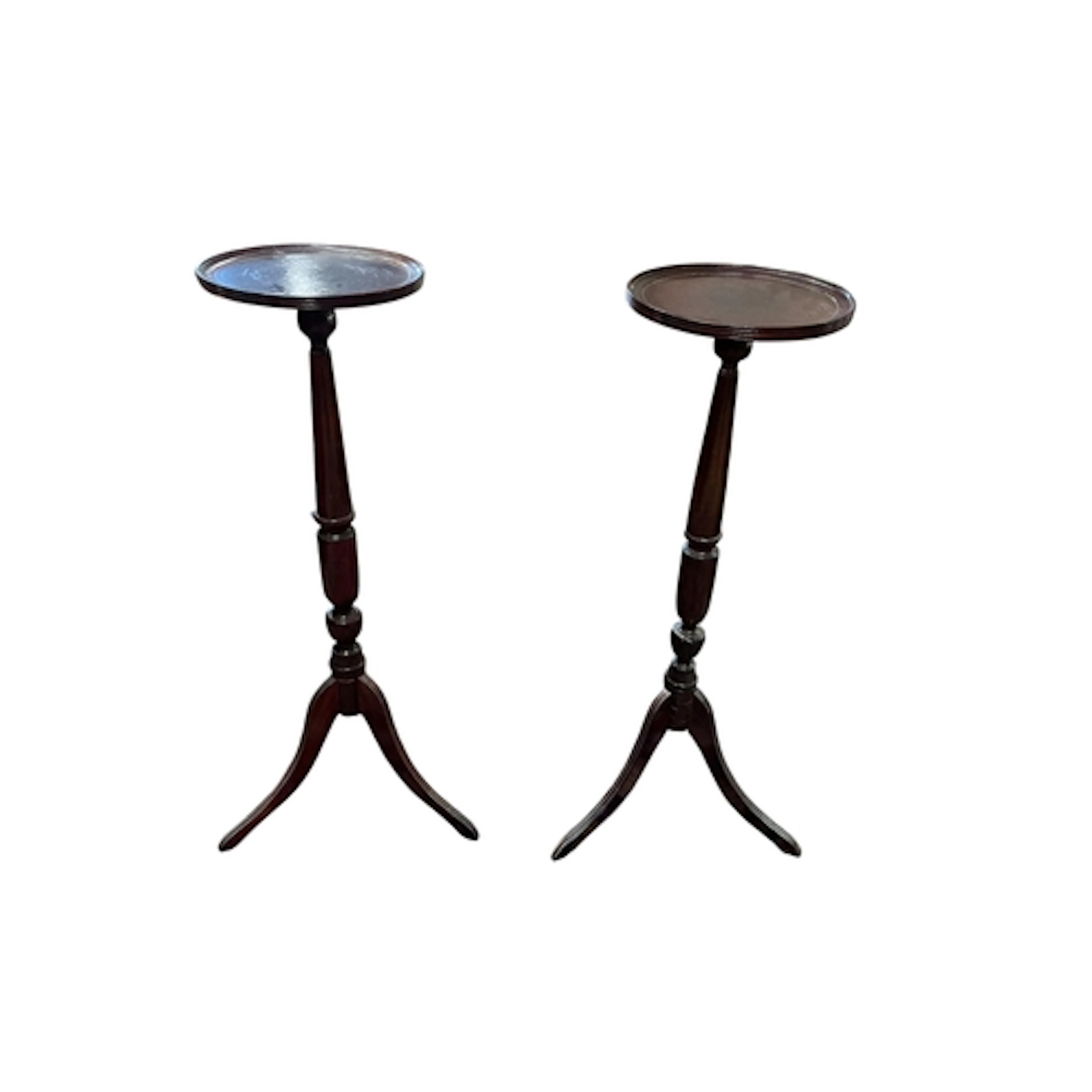 A pair of mahogany torcheres, diameter 28cm, height 89cm...