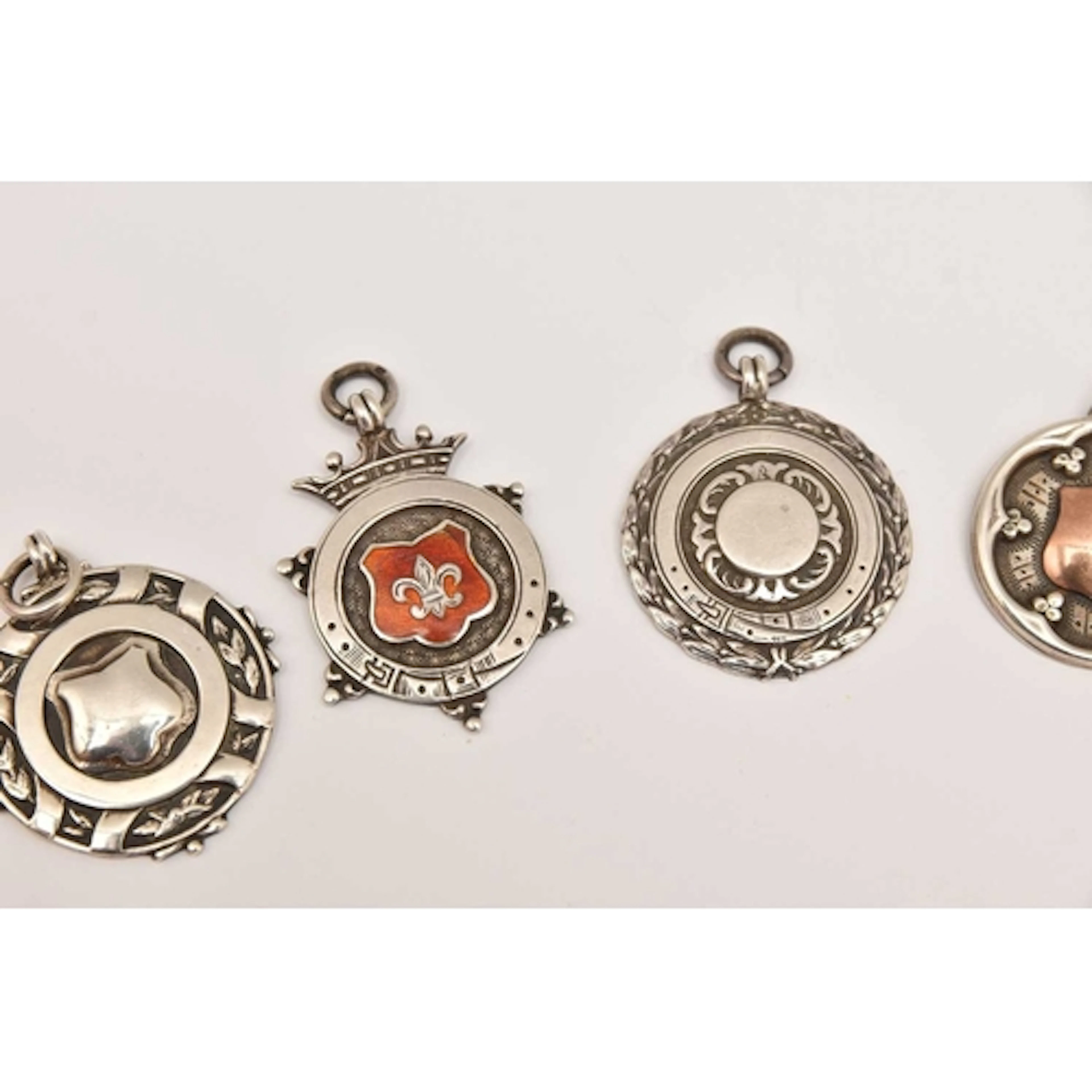 A SMALL ASSORTMENT OF SILVER MEDALS, two for the 'Cole Cup' ...