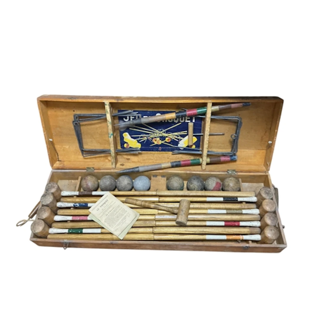 An early 20th century French eight mallet cased croquet set ...