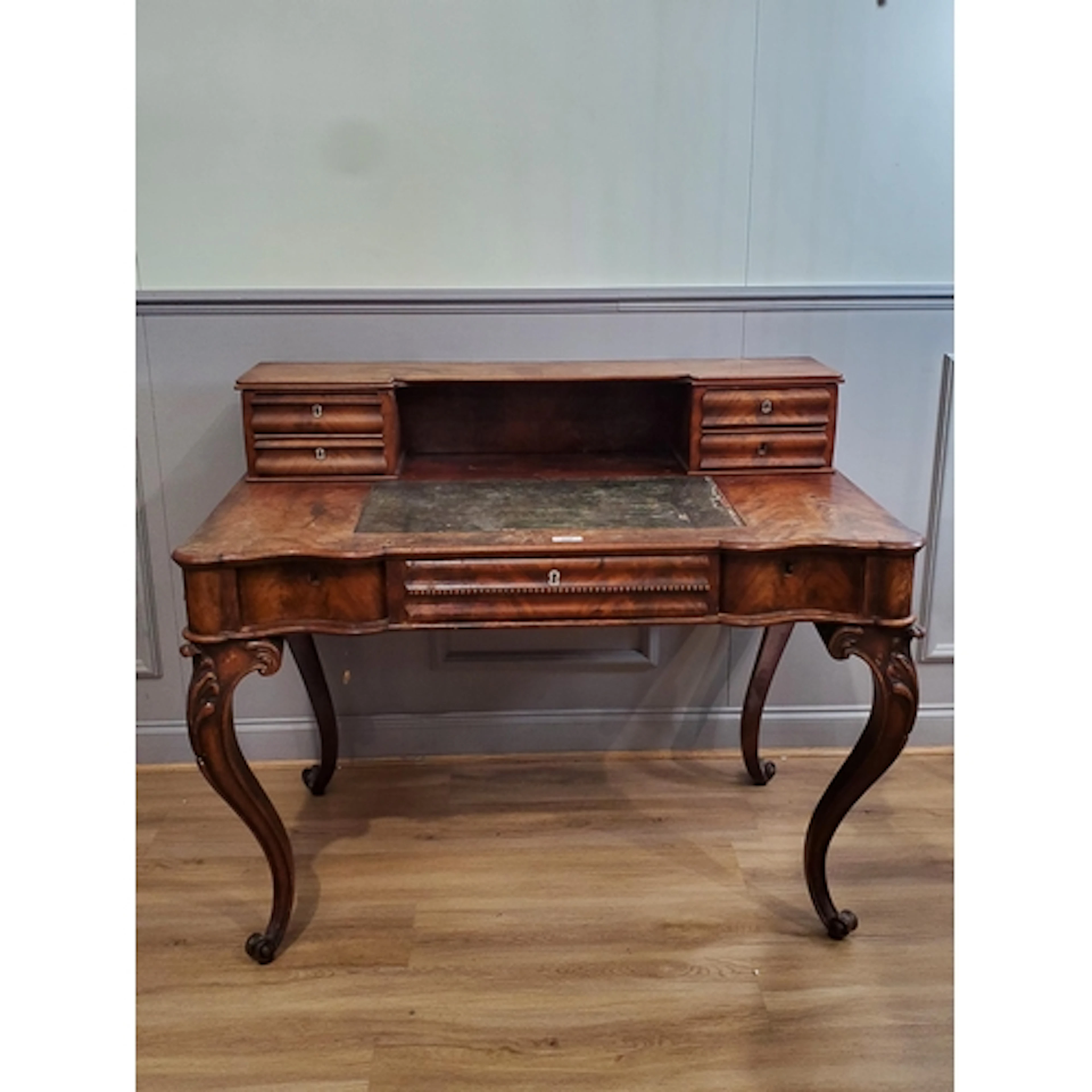 A Victorian mahogany Writing Desk with raised back fitted fo...