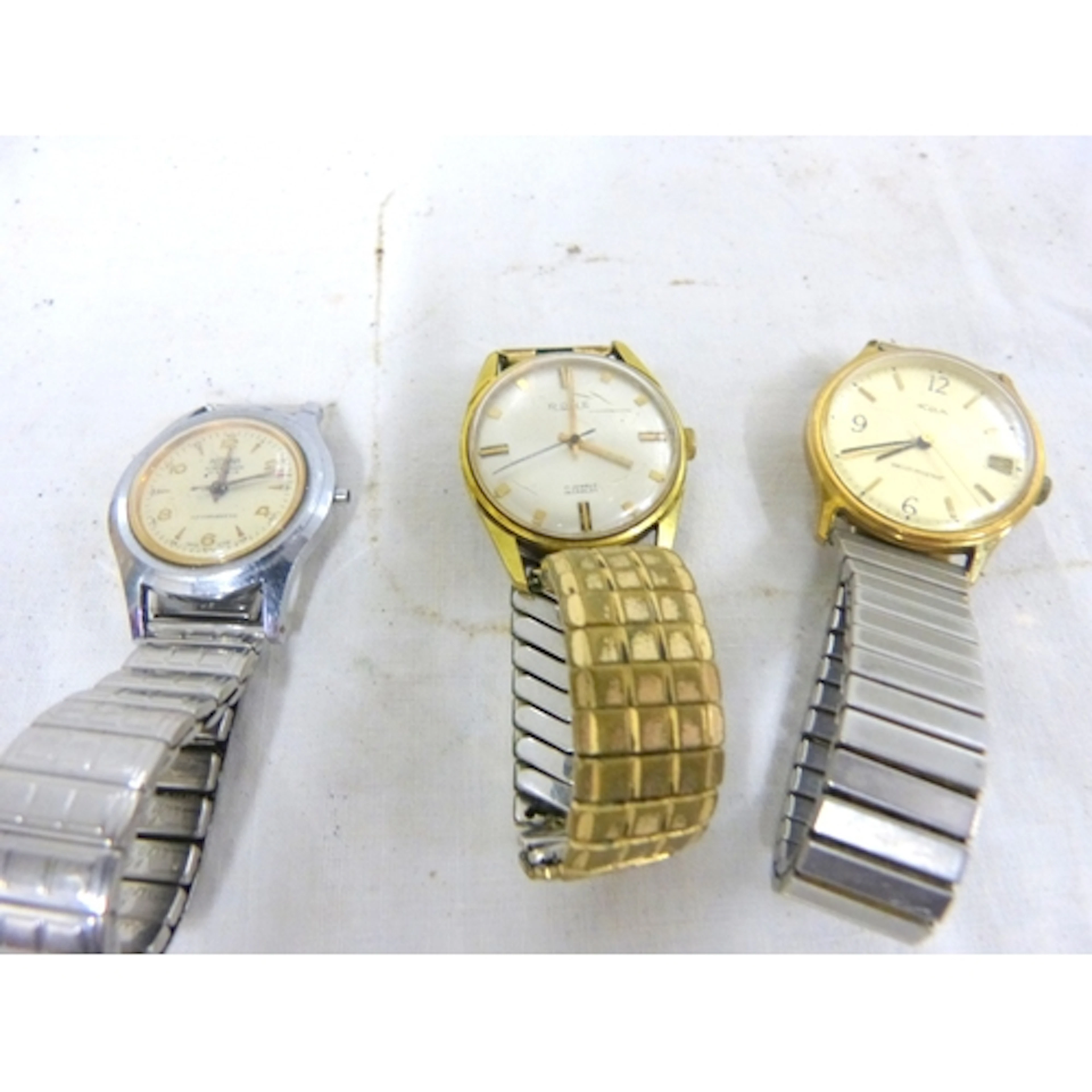 Three vintage men watches to include Medan, Rone and Acua.