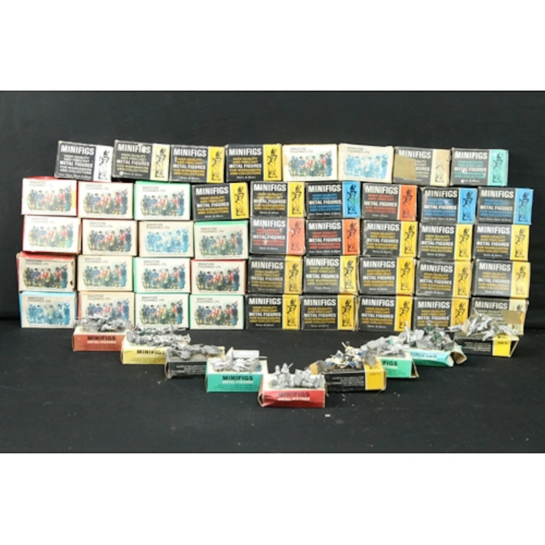 Collection of 53 boxed military and war gaming metal minifig...