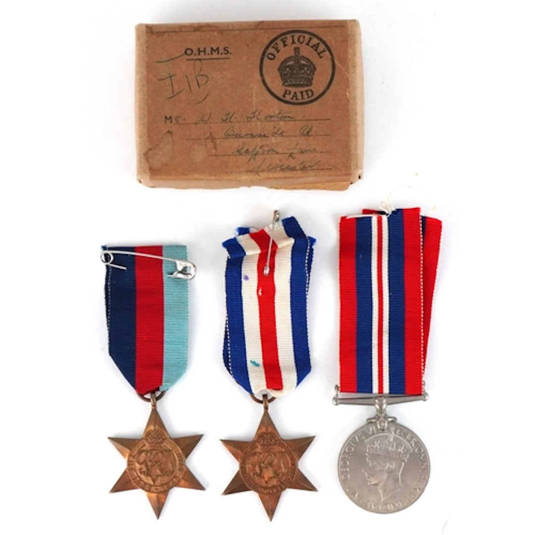 British military interest World War II medals with postage b...