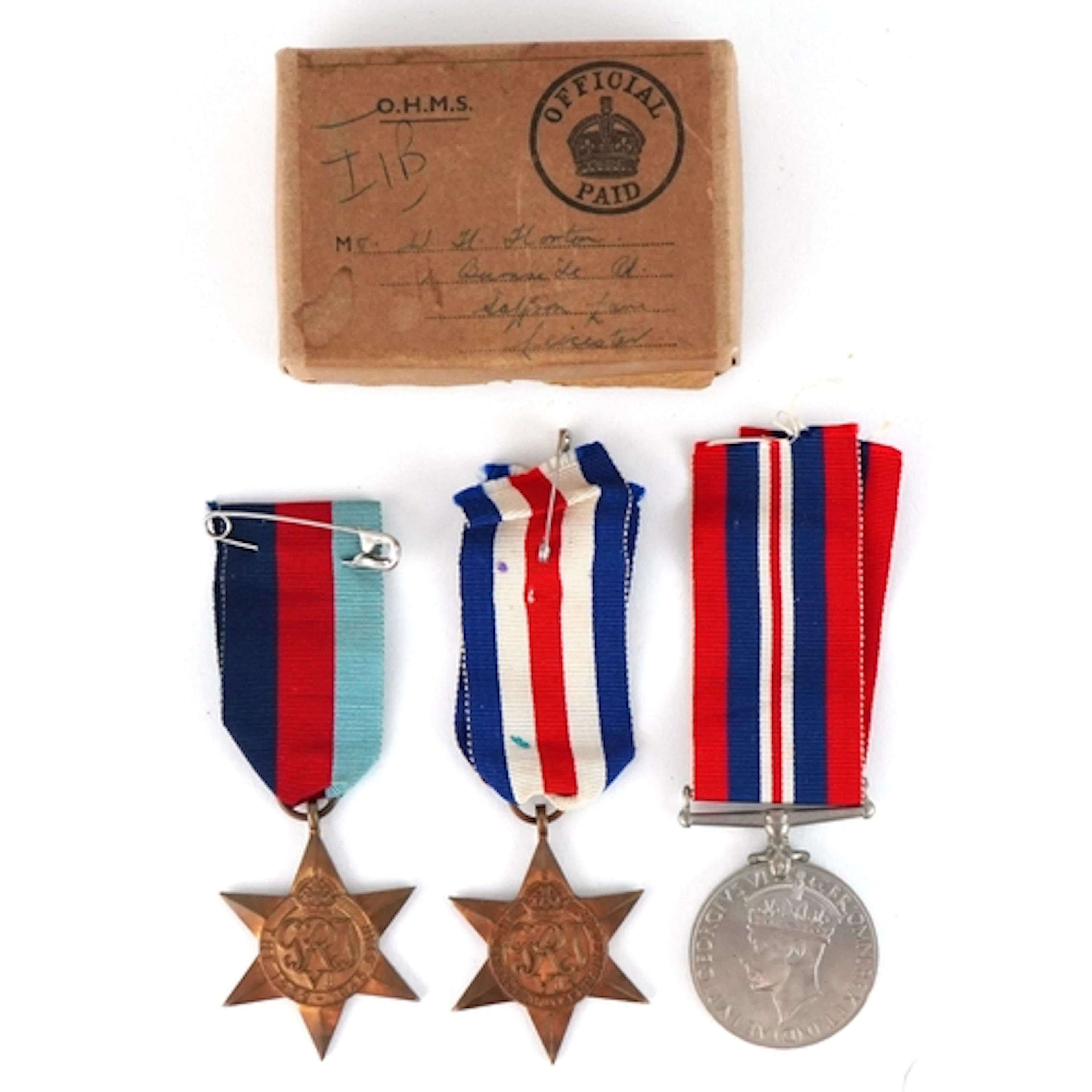 British military interest World War II medals with postage b...