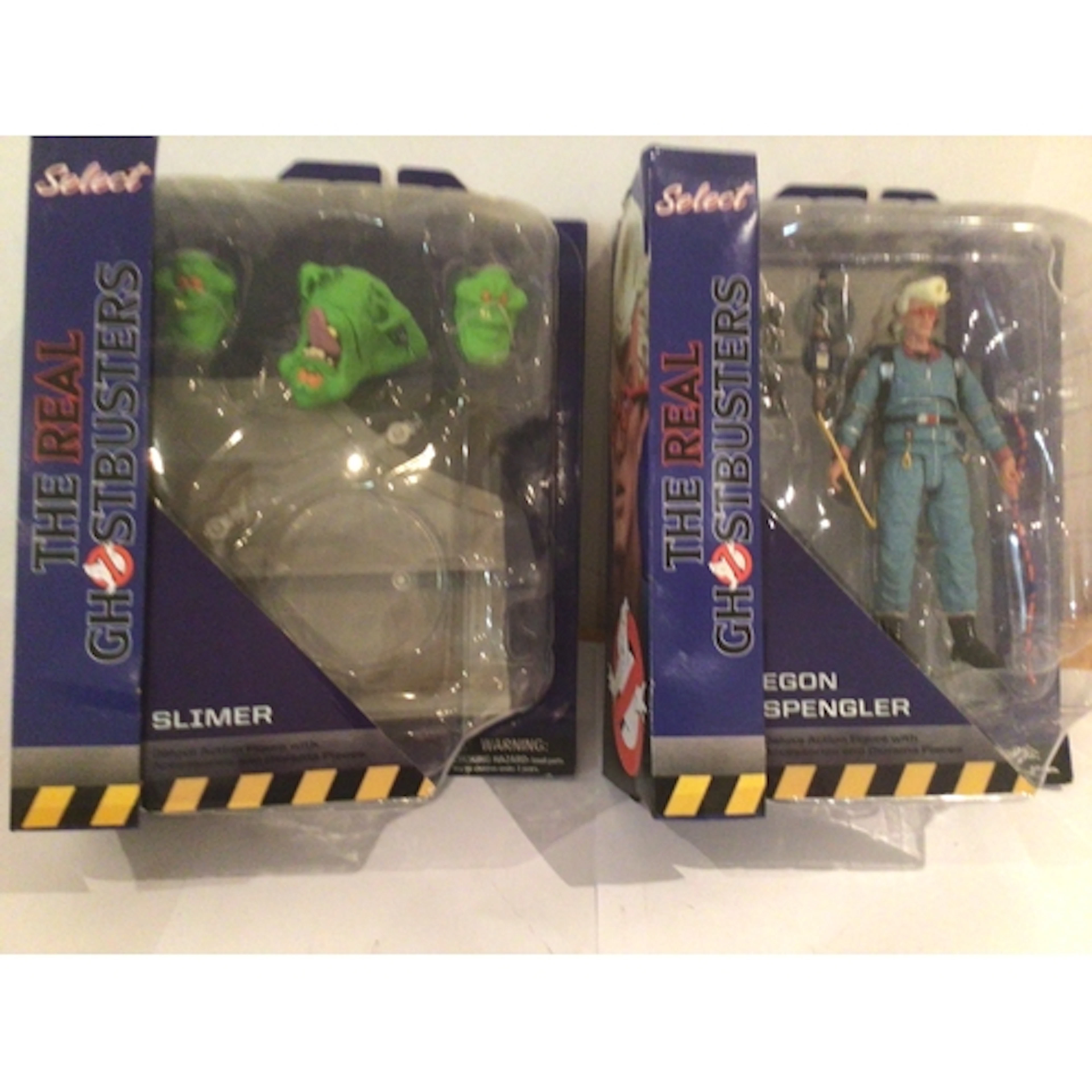 Two boxed and unopened figures featuring Ghostbusters Select...