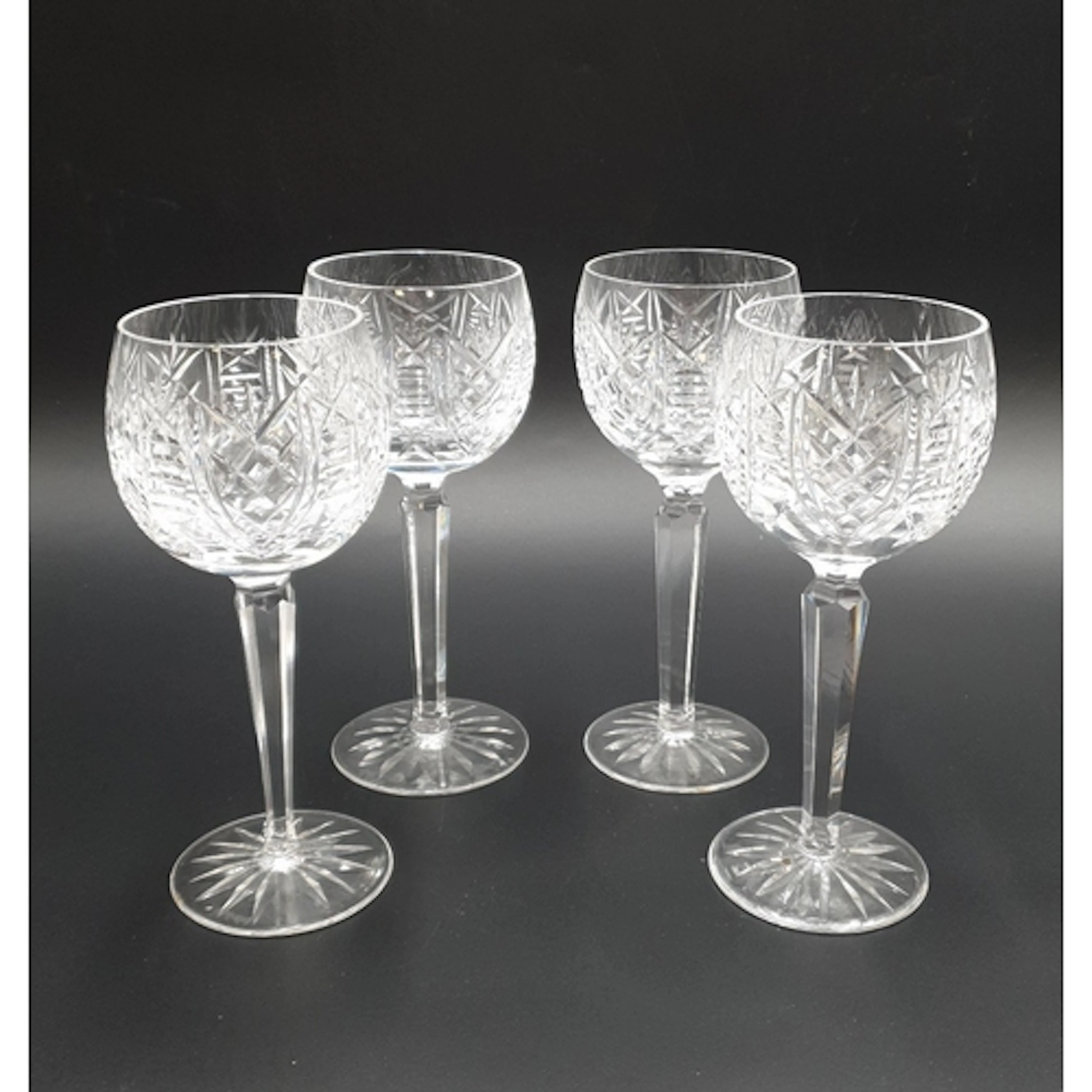 Set of four Waterford cut-crystal stemmed wine glasses H:19...
