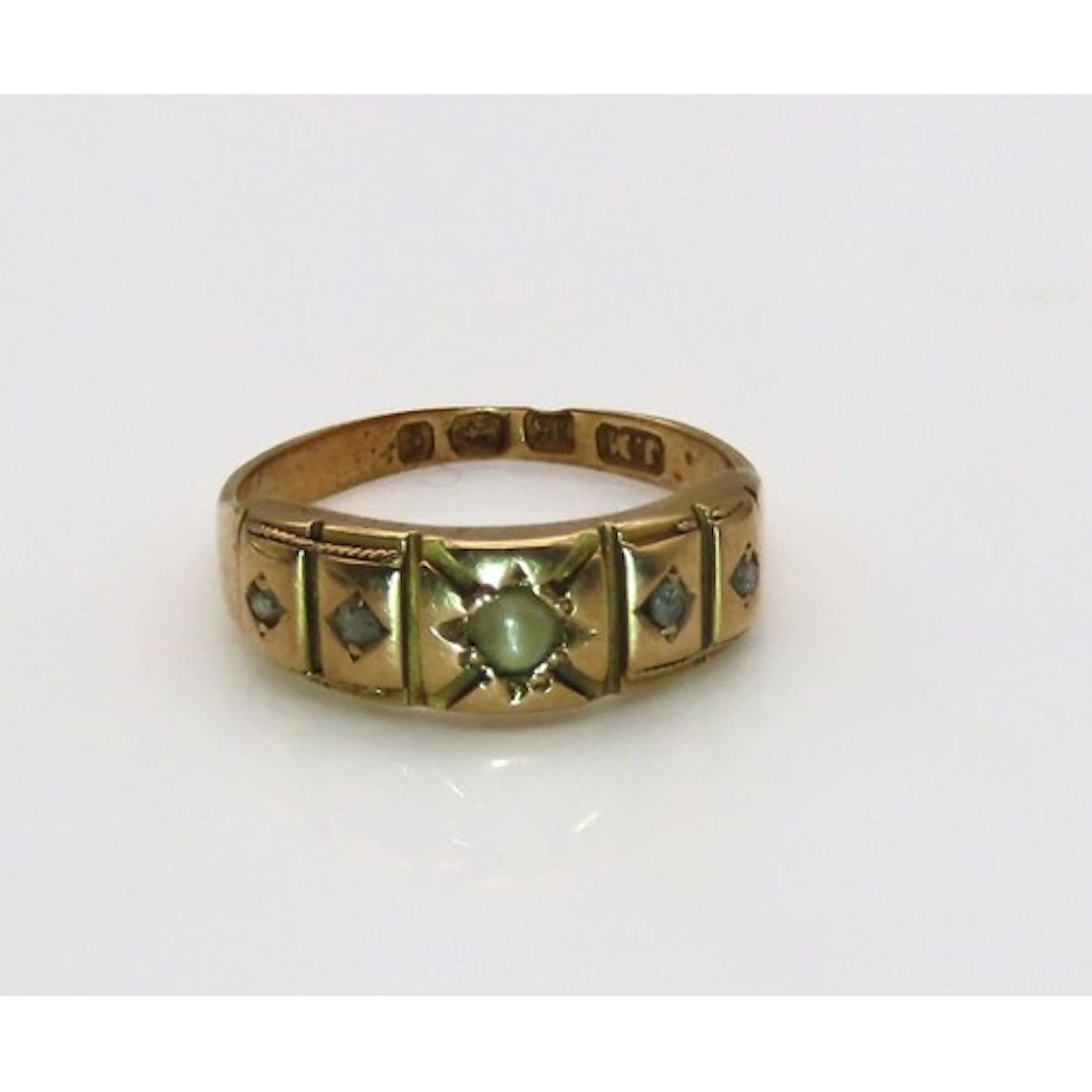 A Victorian pearl and diamond ring, the central pearl flanke...