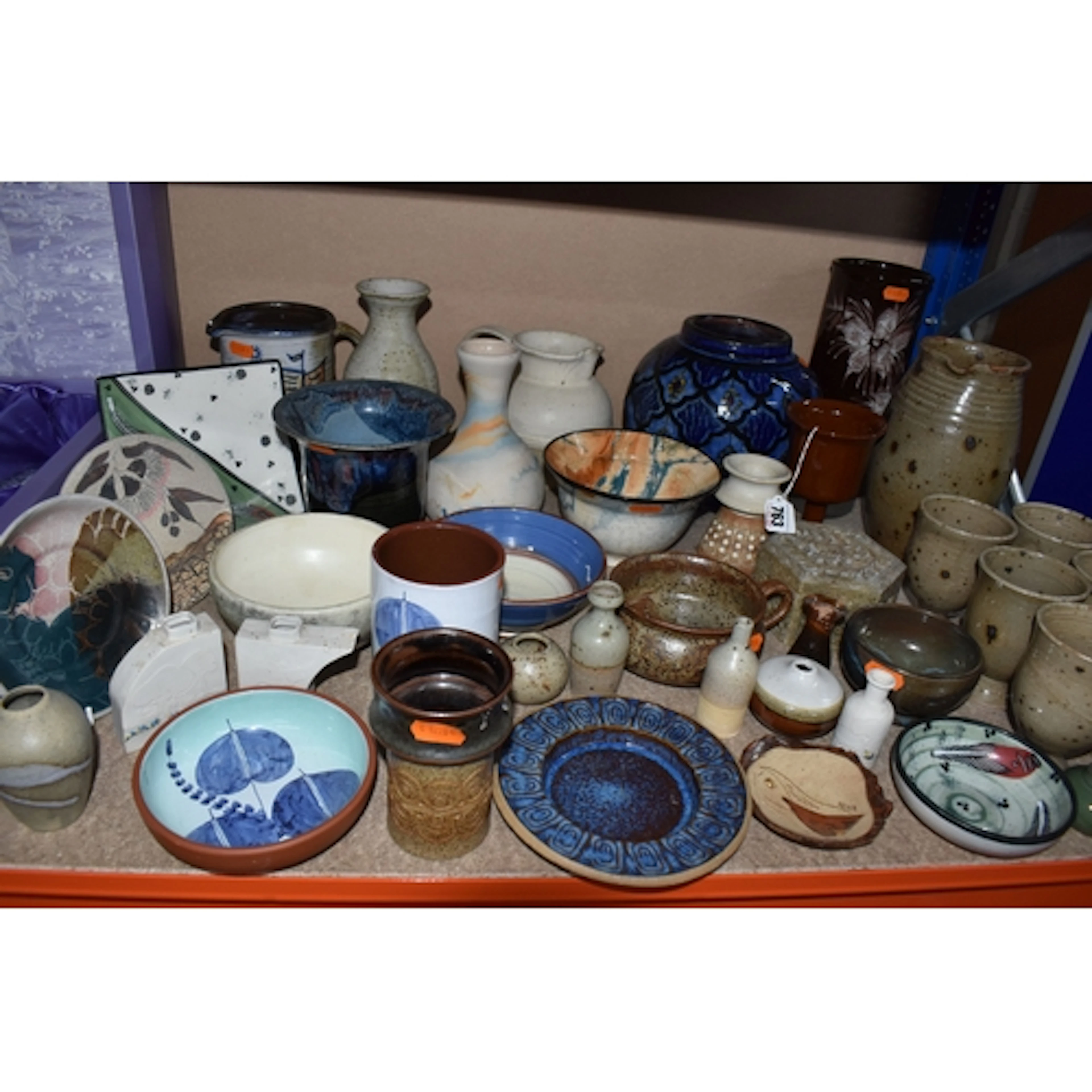 A QUANTITY OF STUDIO POTTERY to include a jug with six goble...