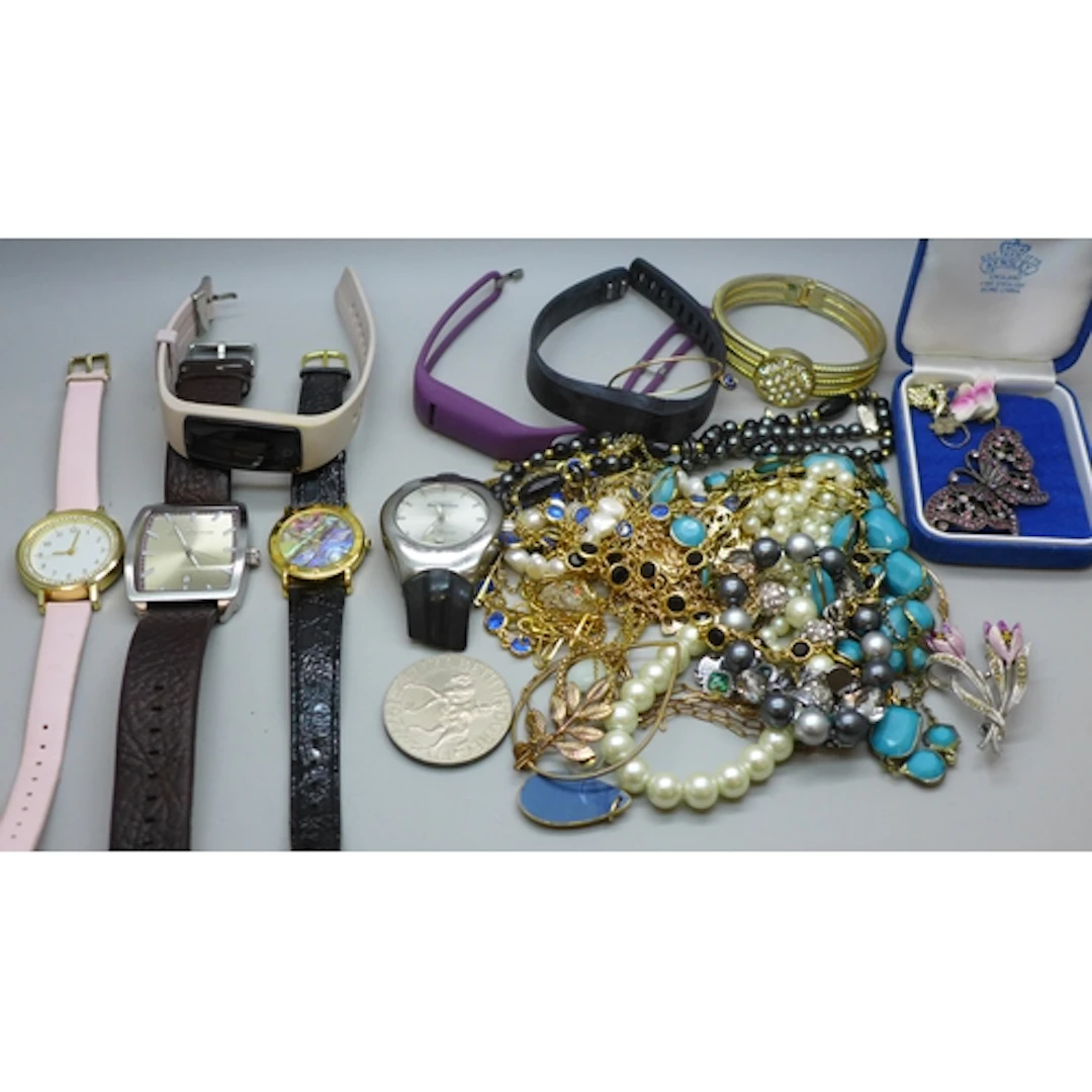 A collection of wristwatches and costume jewellery