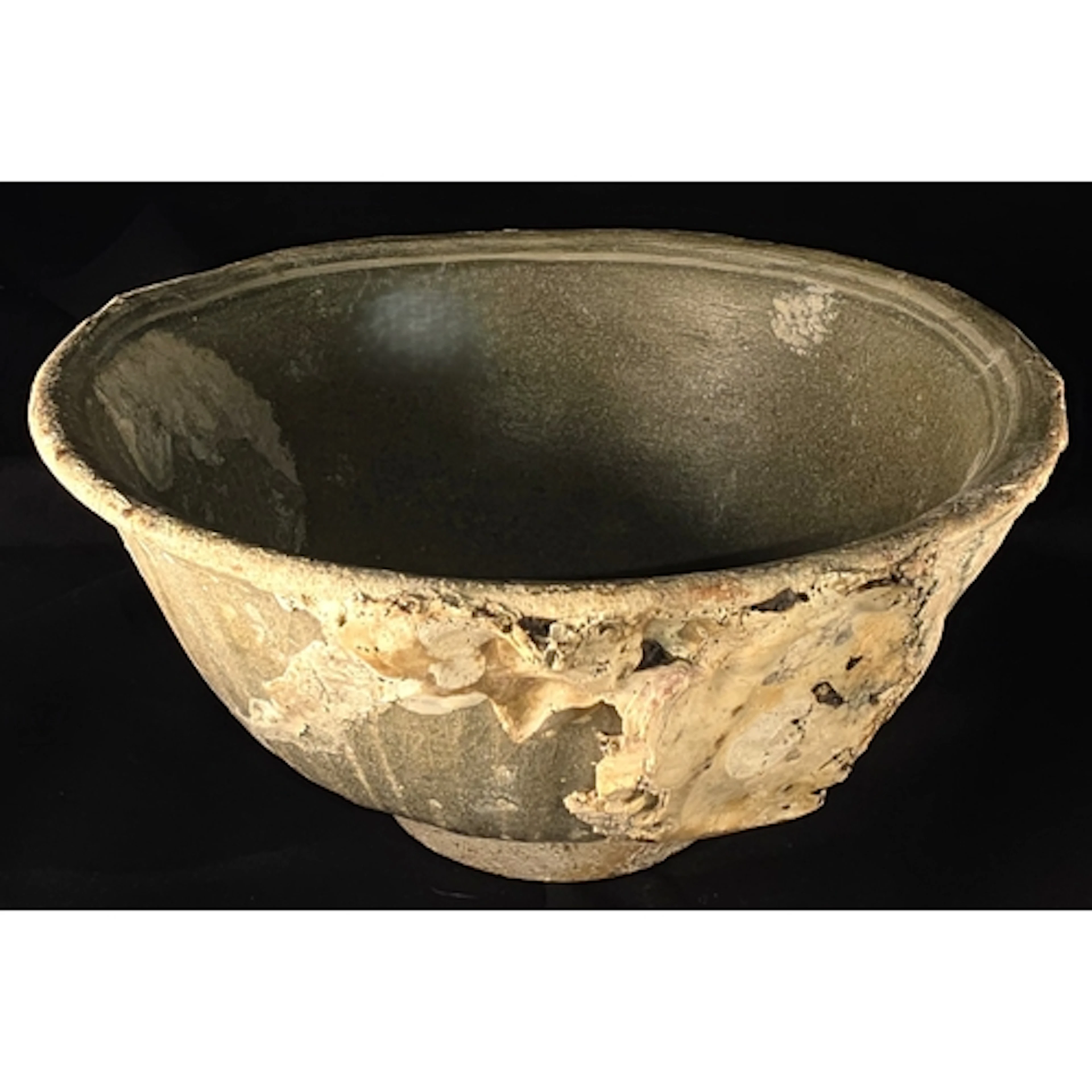 An Antique South East Asian pottery ship wreck bowl, heavily...