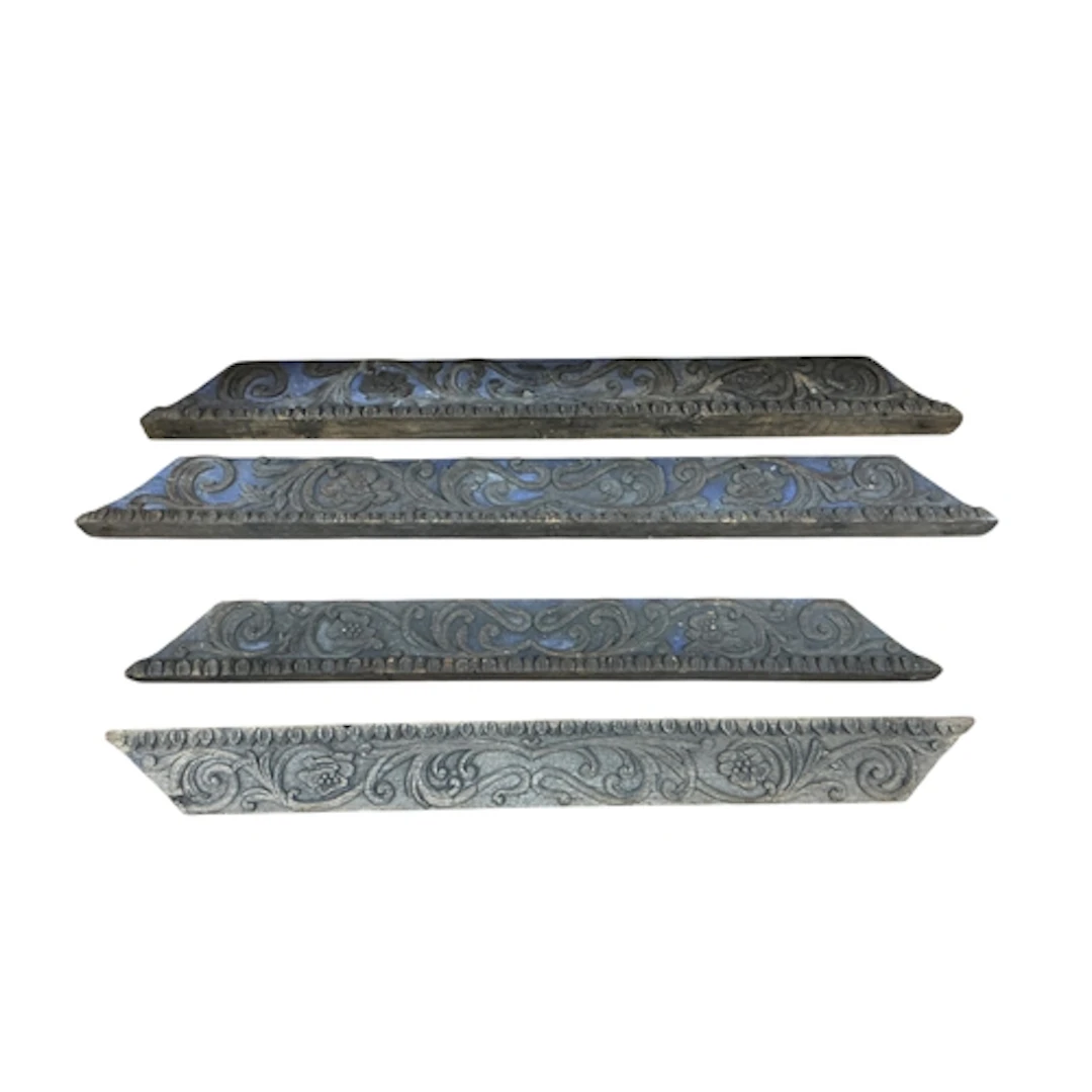 Four Indian carved hardwood and polychrome architectural mou...