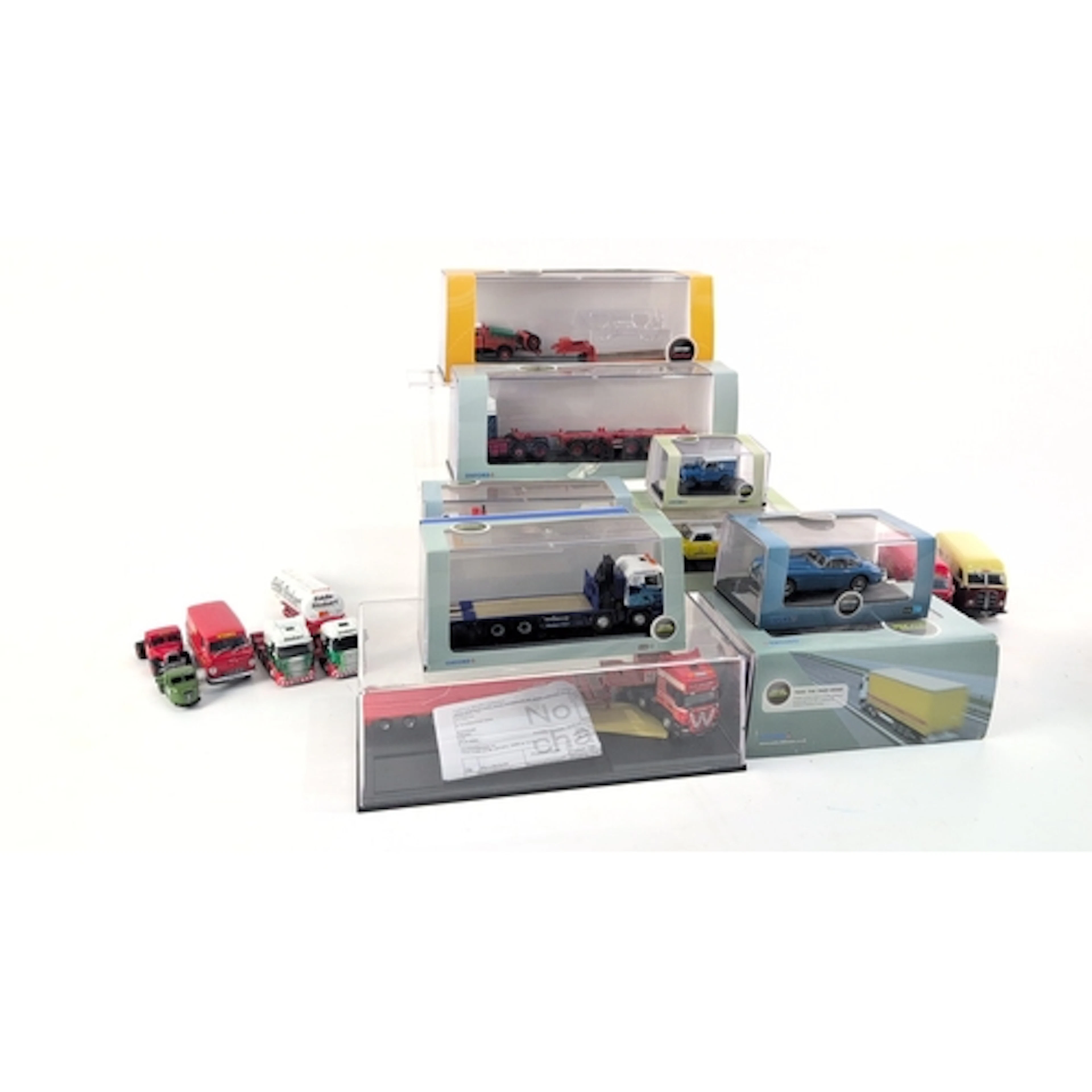 A collection of die-cast model commercial vehicles, largely ...