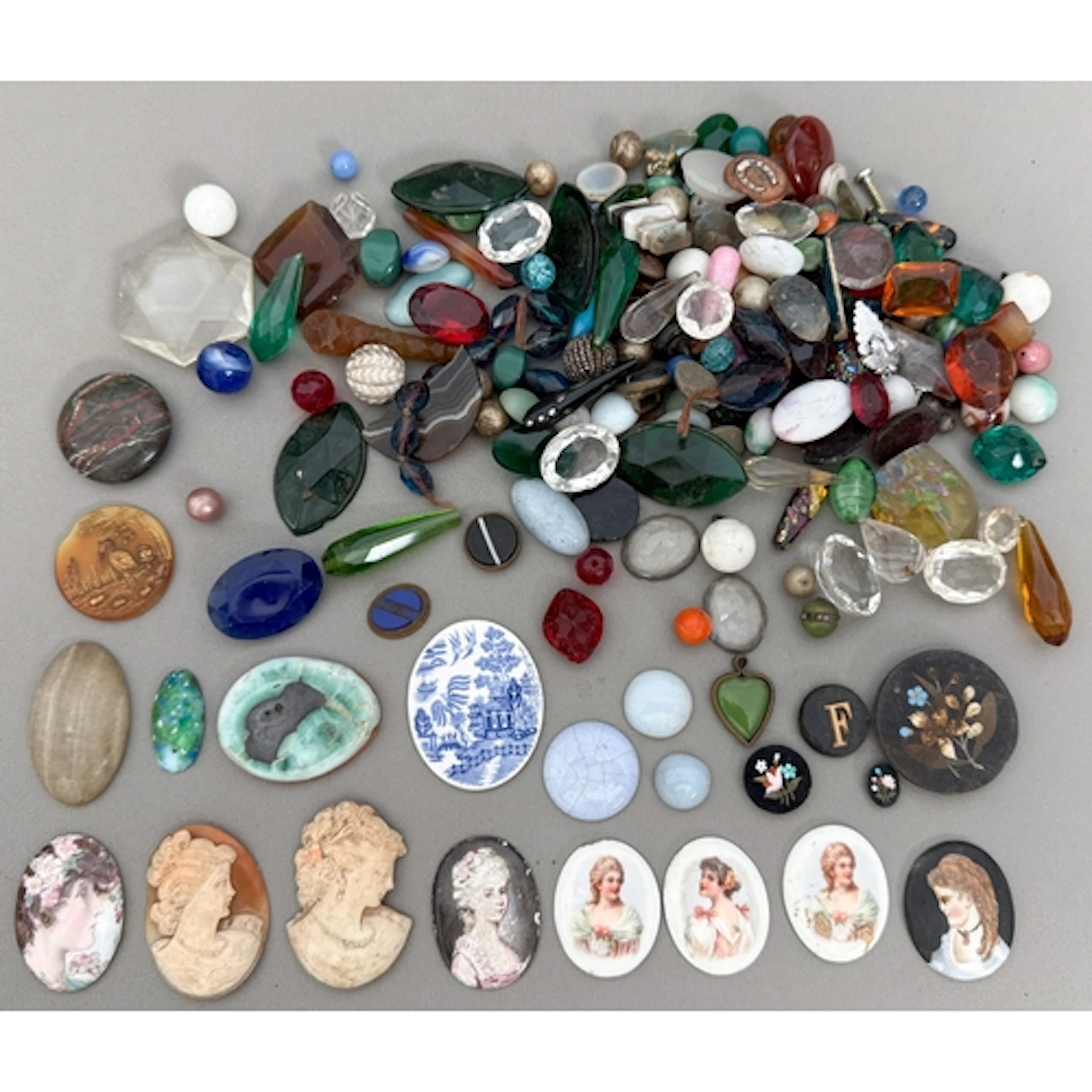 A quantity of decorative beads and embellishments - mostly g...