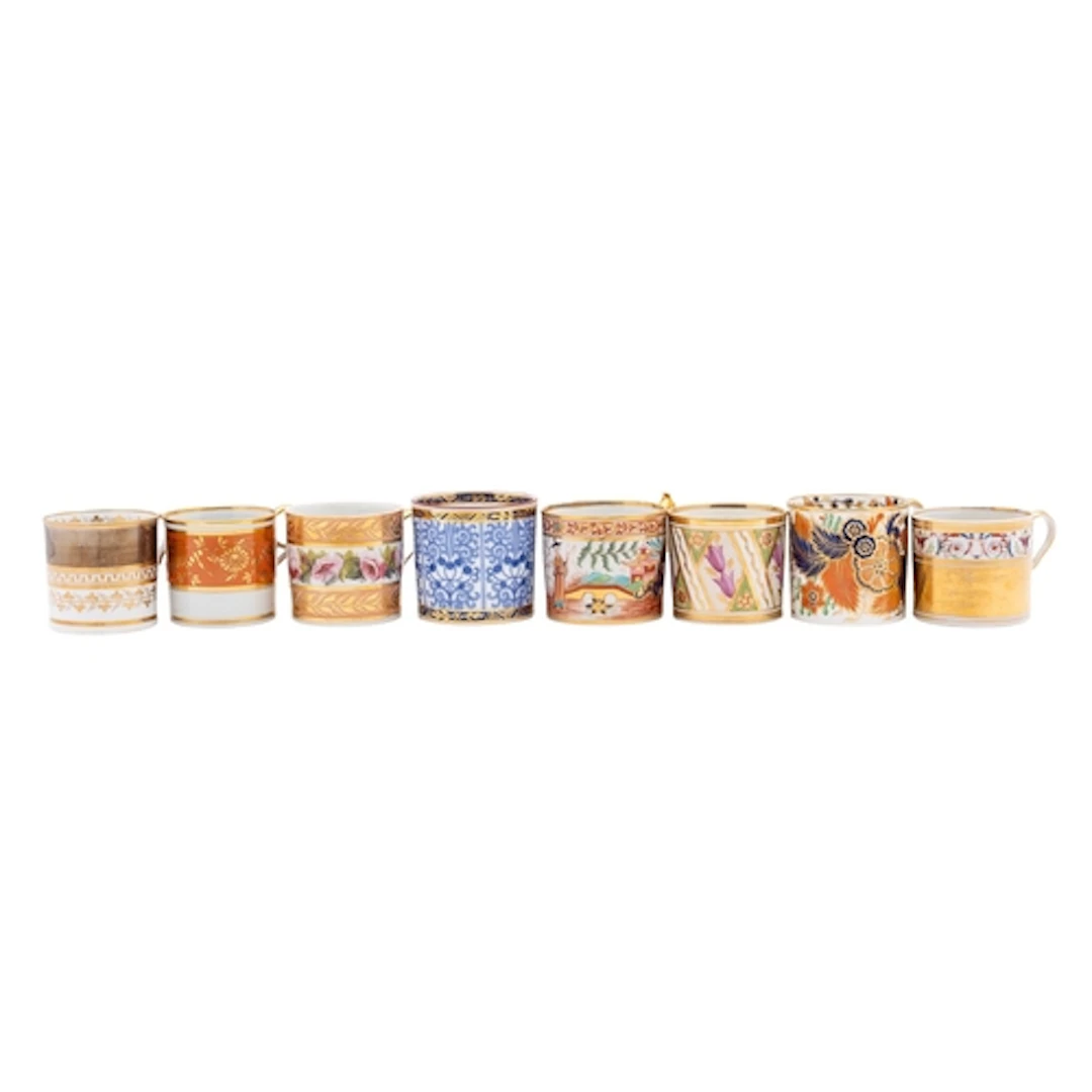 A collection of seventeen English porcelain coffee cans, ear...