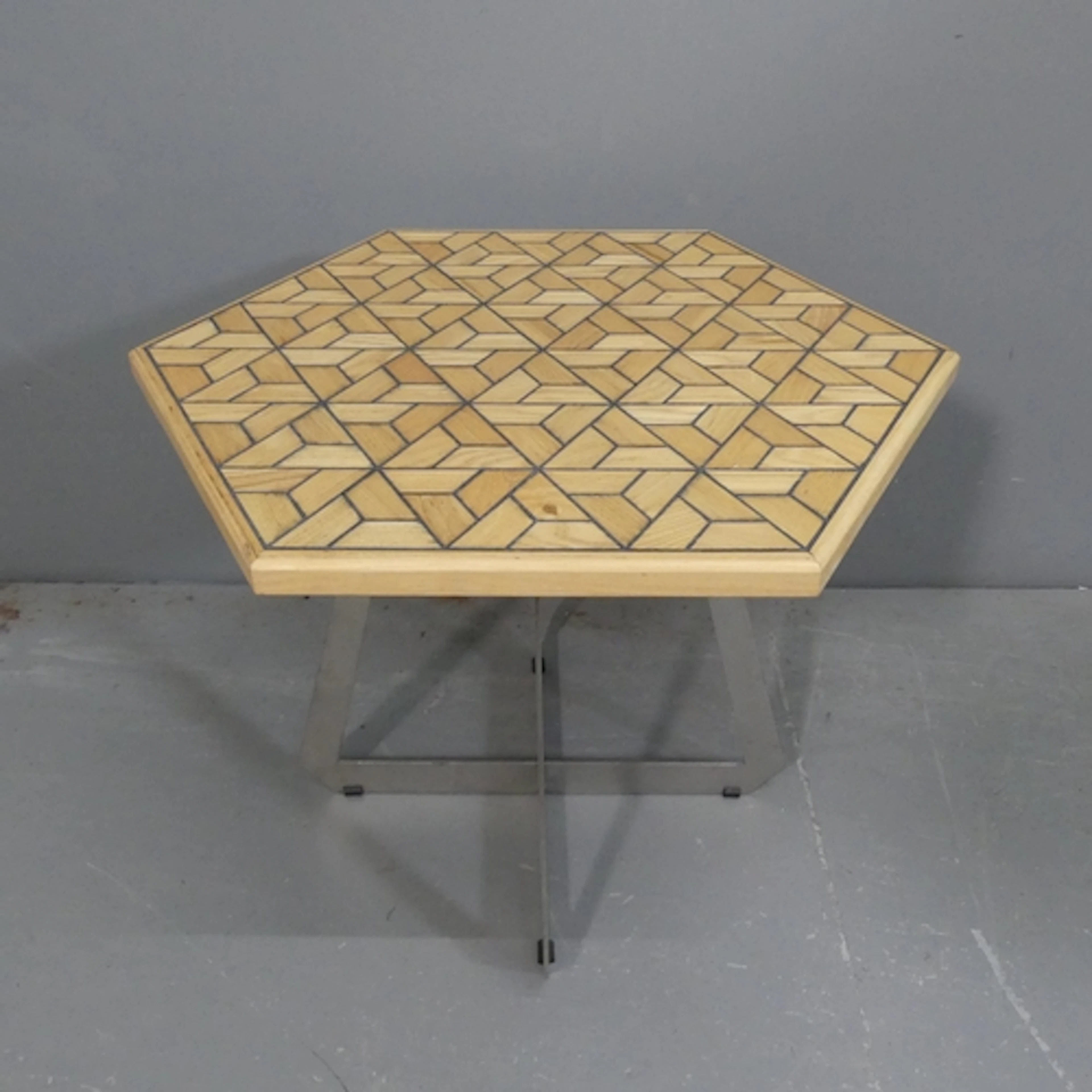 A contemporary hexagonal resin marquetry inlaid occasional t...