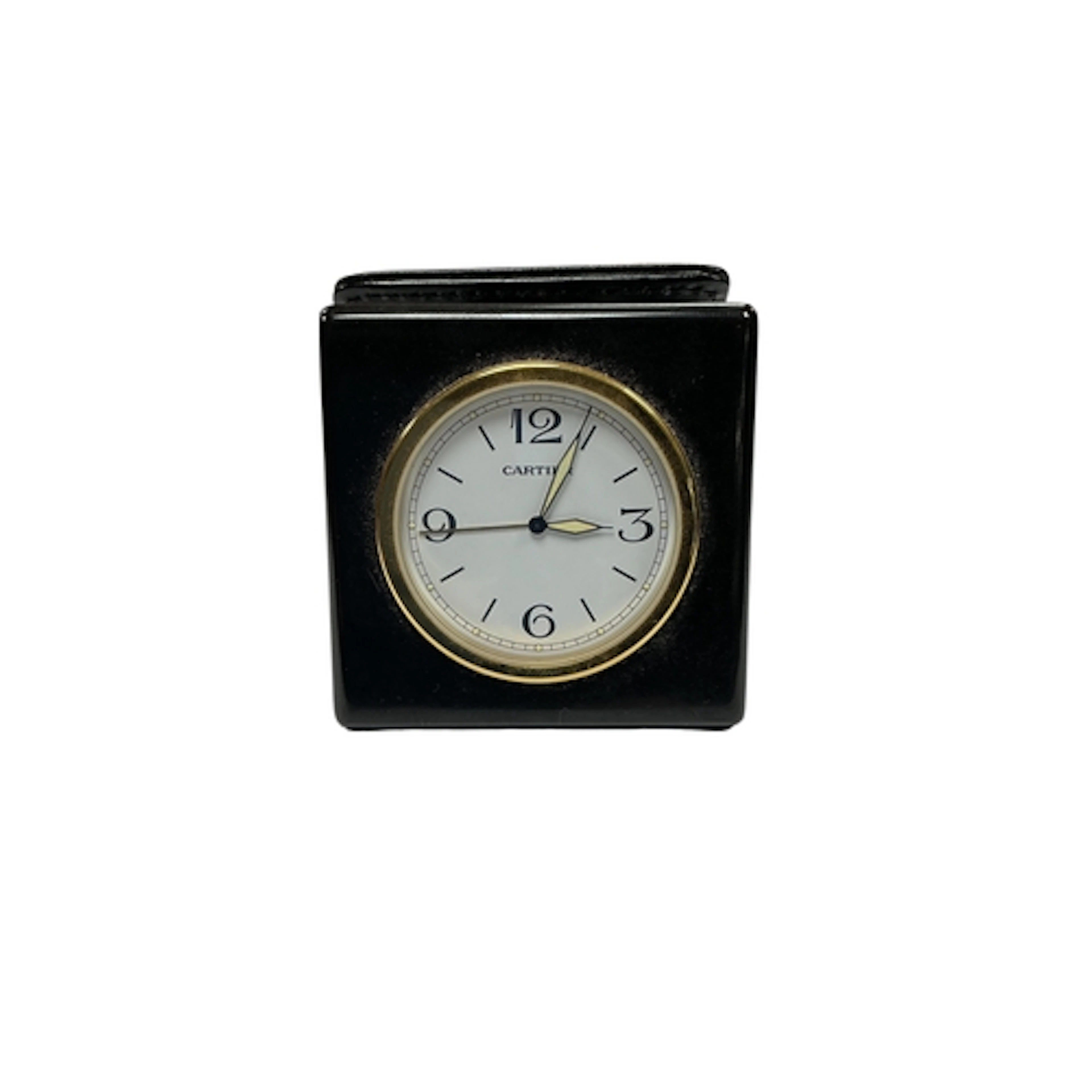 A Cartier Panthere travel clock, ref. 011426HF, attached to ...