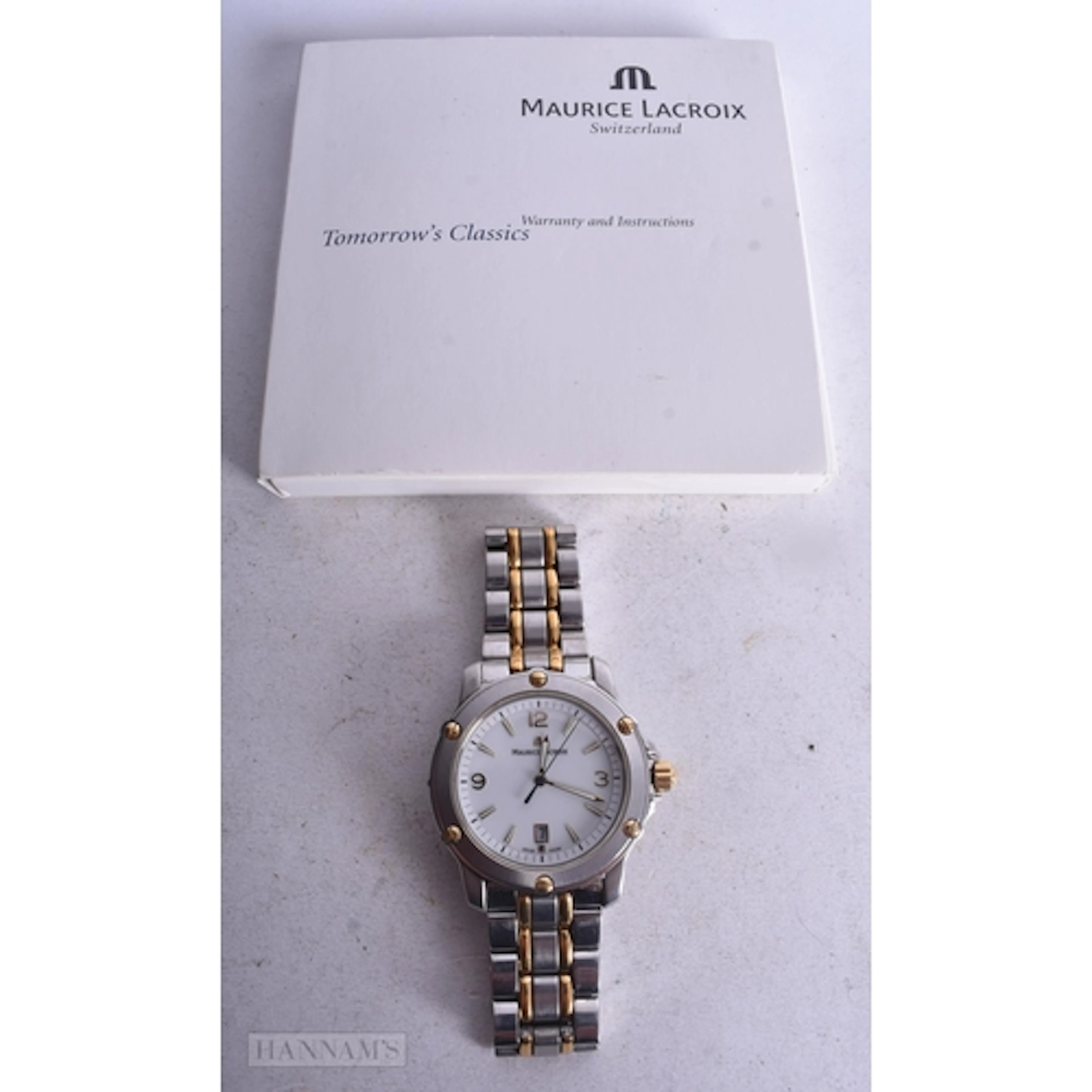 A Maurice Lacroix Watch with papers. Working. 4.5cm incl c...