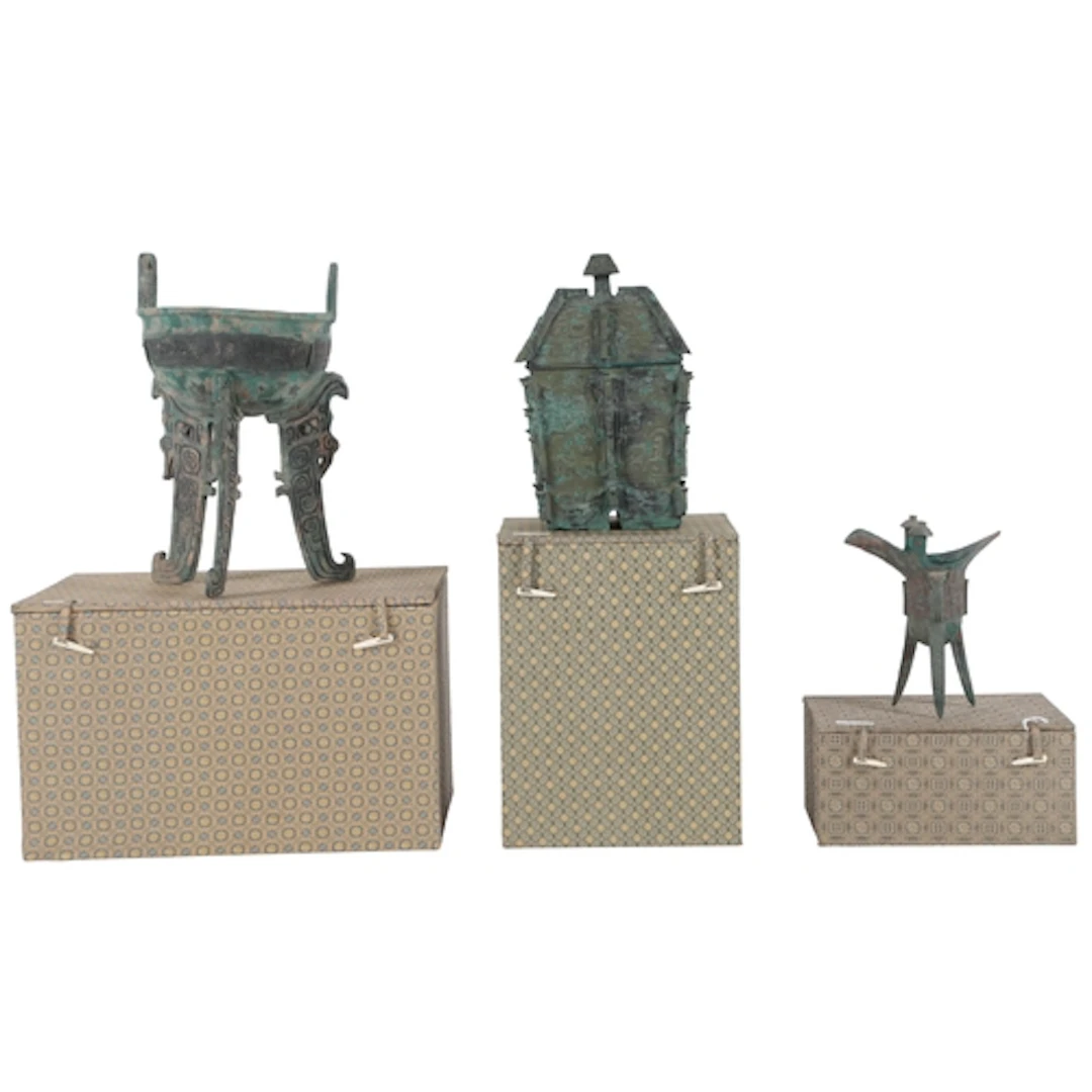 Three Chinese patinated bronze archaistic models of a Fang Y...