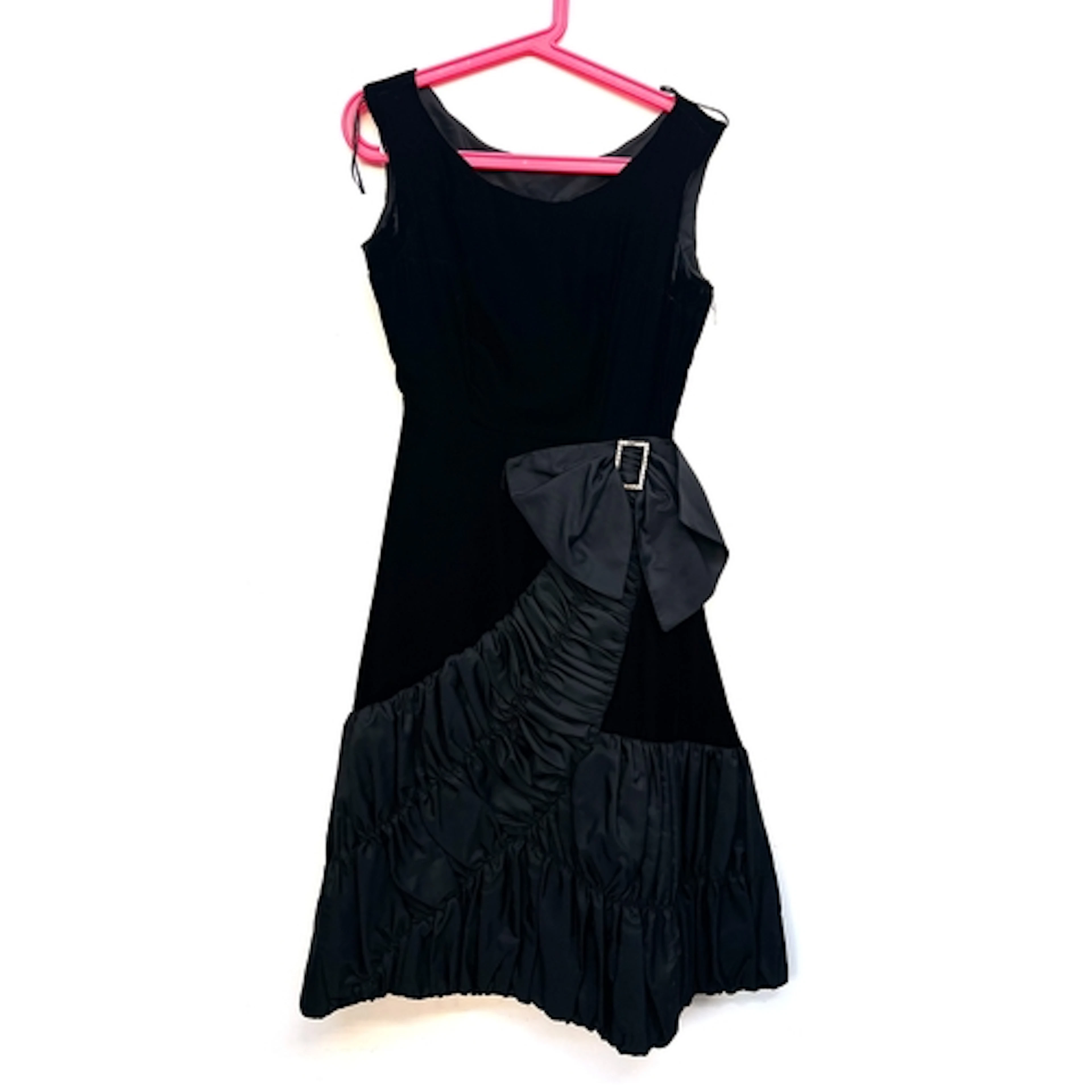A vintage black velvet and satin party dress with asymmetric...