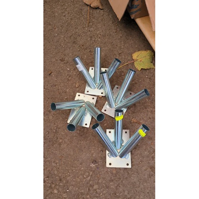 Four three-way galvanised steel flagpole brackets, each with...