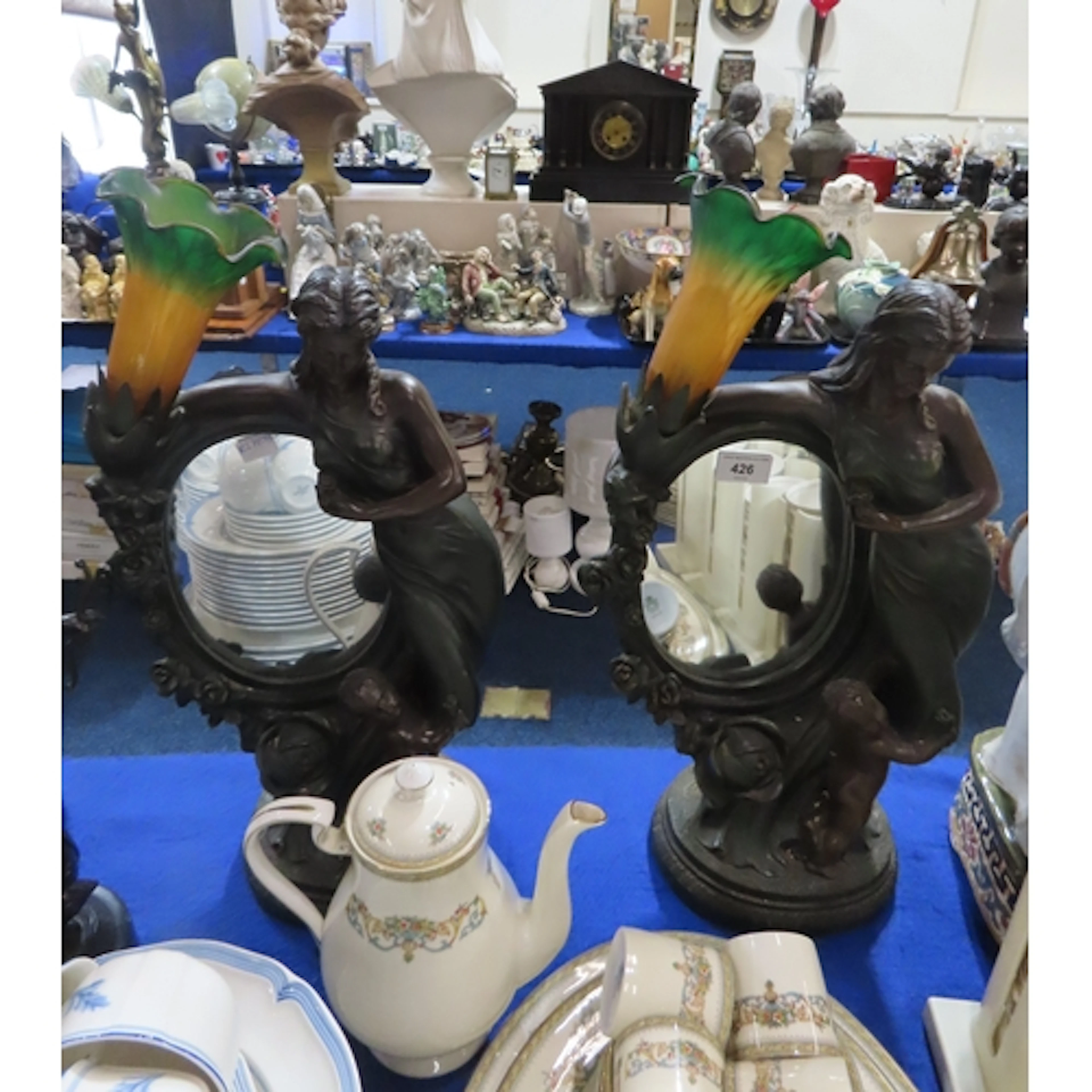 A pair of Art Nouveau style table lamps with inset mirrors