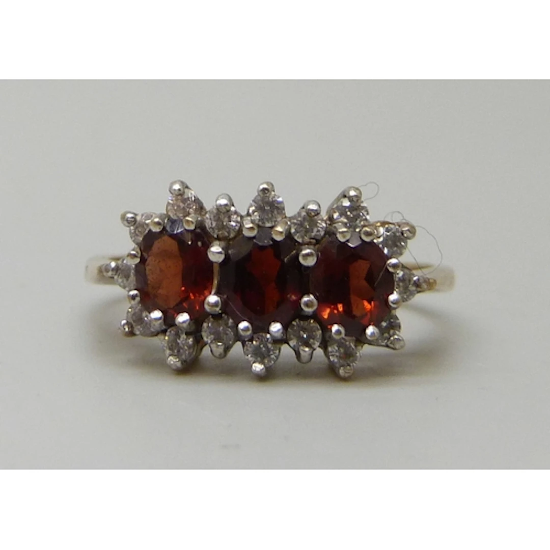 A 9ct gold, garnet and white stone cluster ring, 2.7g, Q