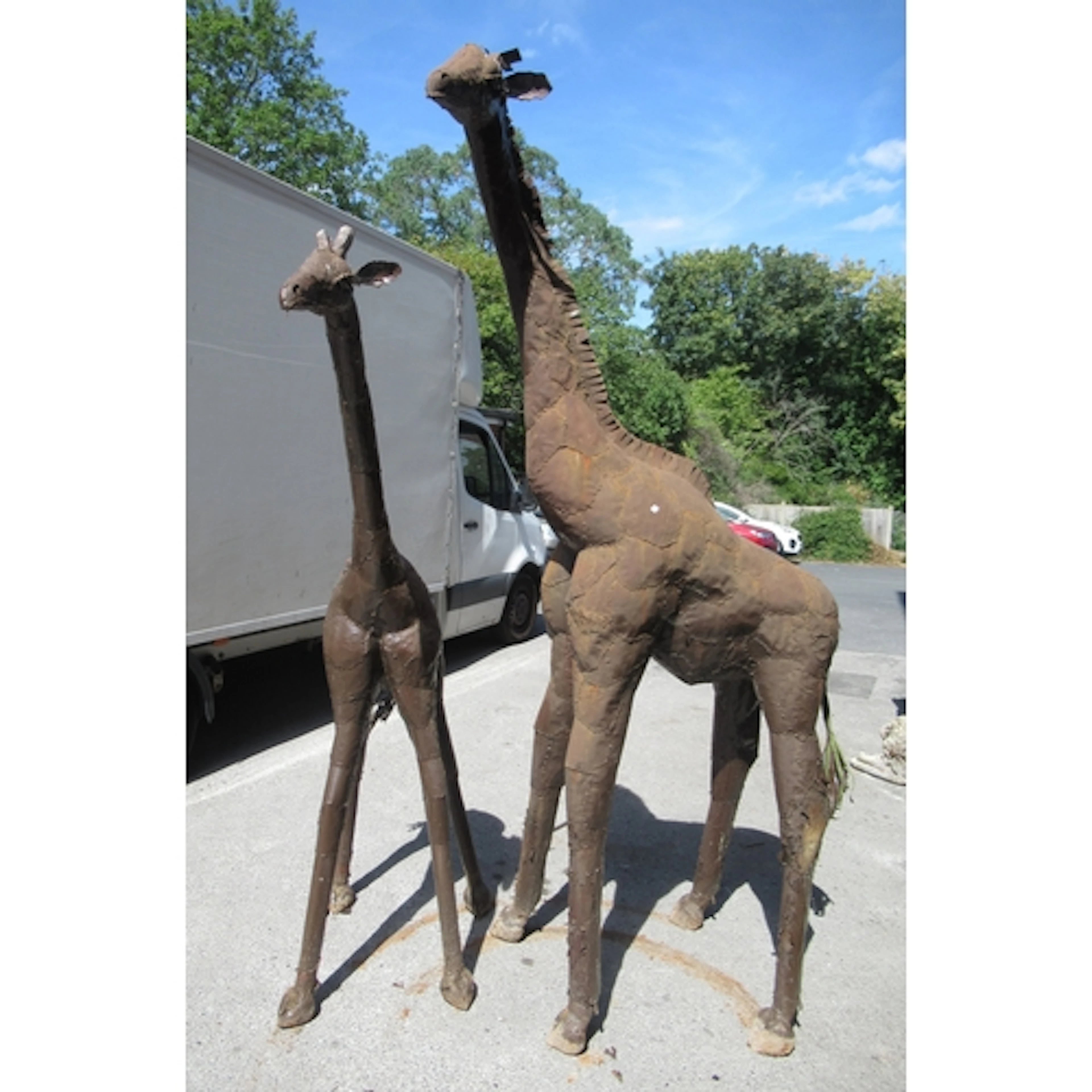 Large 20th Century metal garden sculpture of a giraffe, toge...
