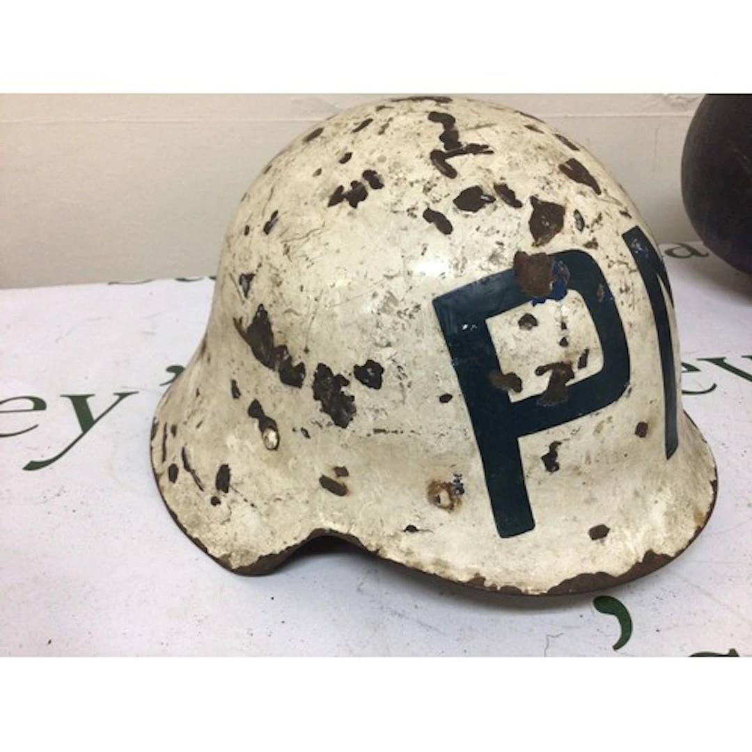 A Spanish Military Police helmet PM on a white ground II wor...