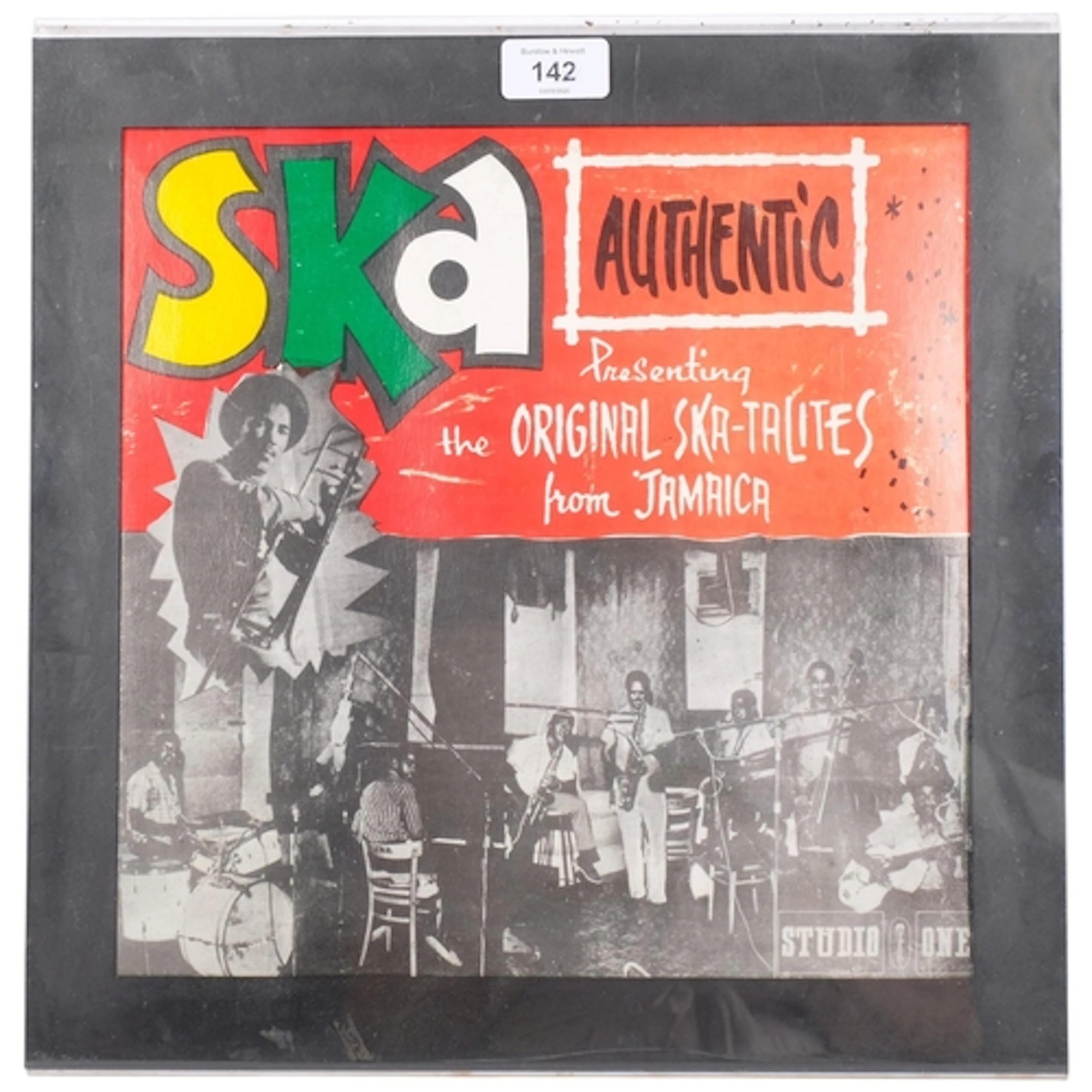 An Art vinyl perspex lock case display, containing a Ska Aut...