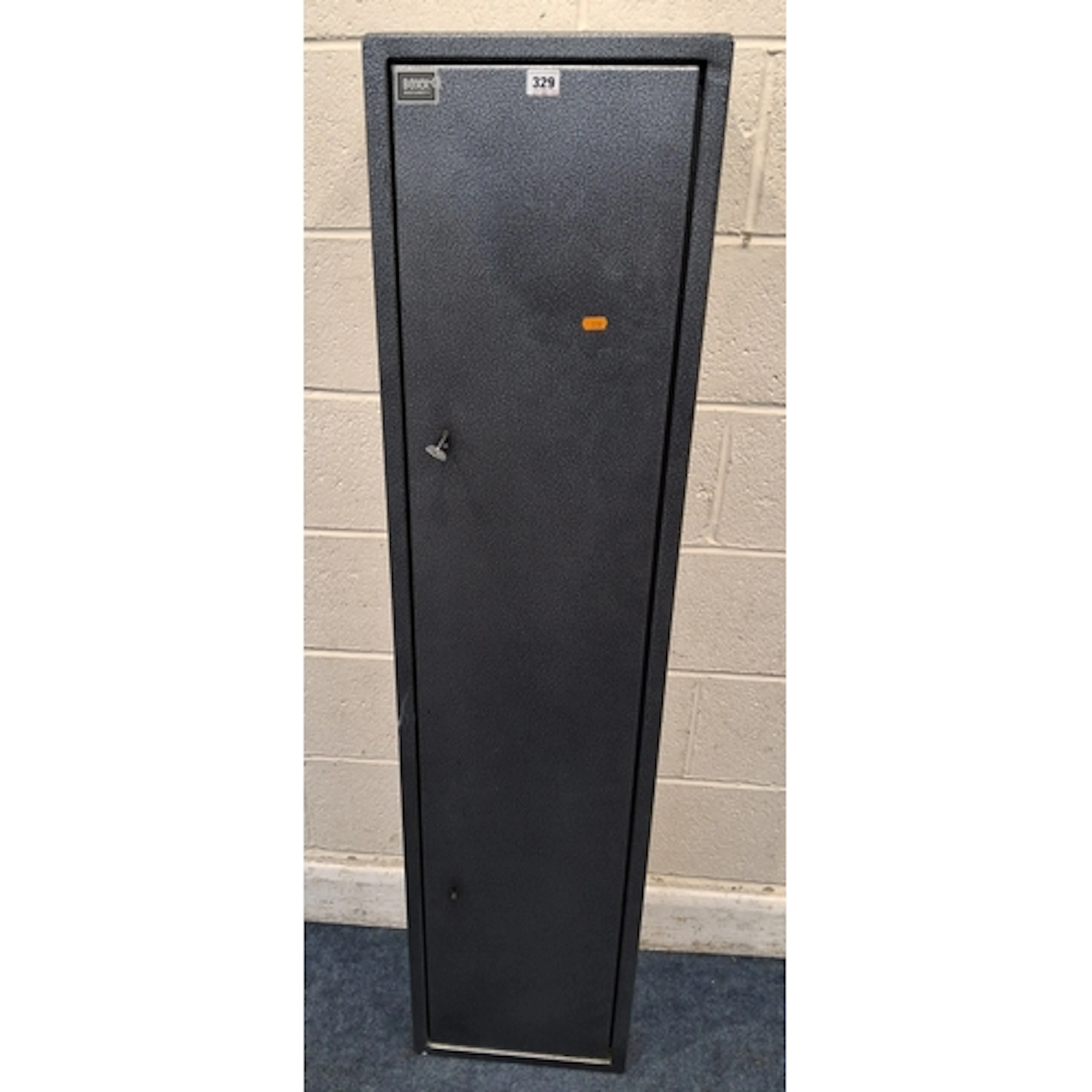 A BOXX SECURITY METAL GUN SAFE, the single door enclosing a ...
