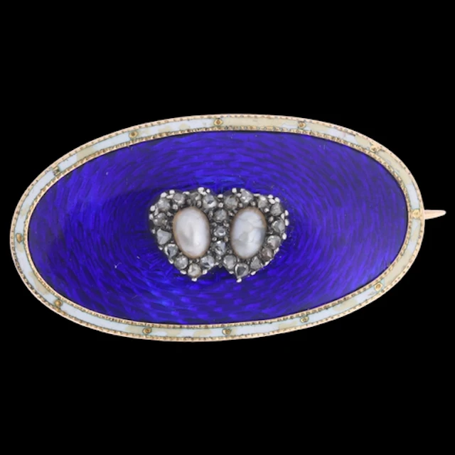An Antique Victorian gold enamel twin-heart sweetheart brooc...