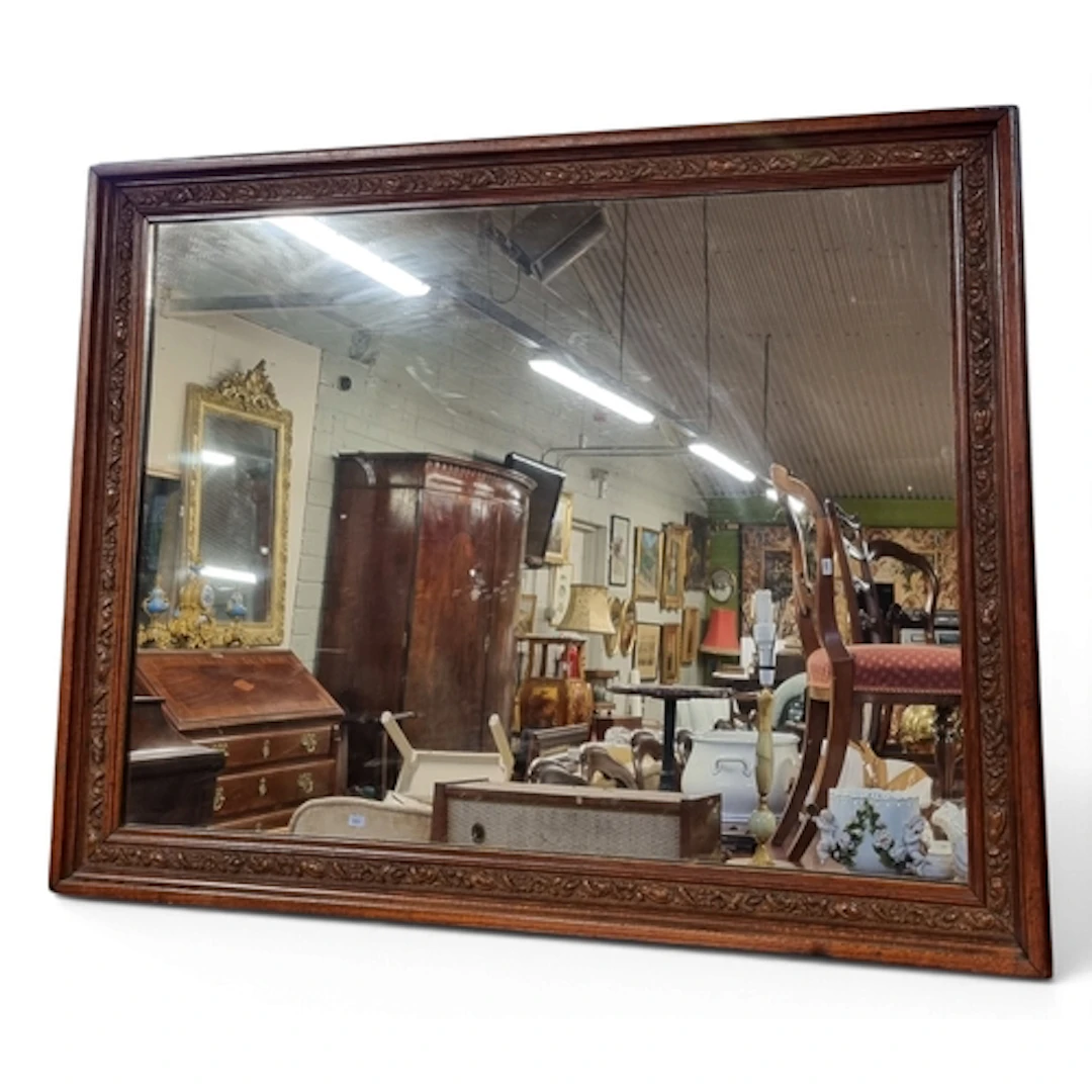 A good early 20th Century Oak moulded rectangular Mirror of ...
