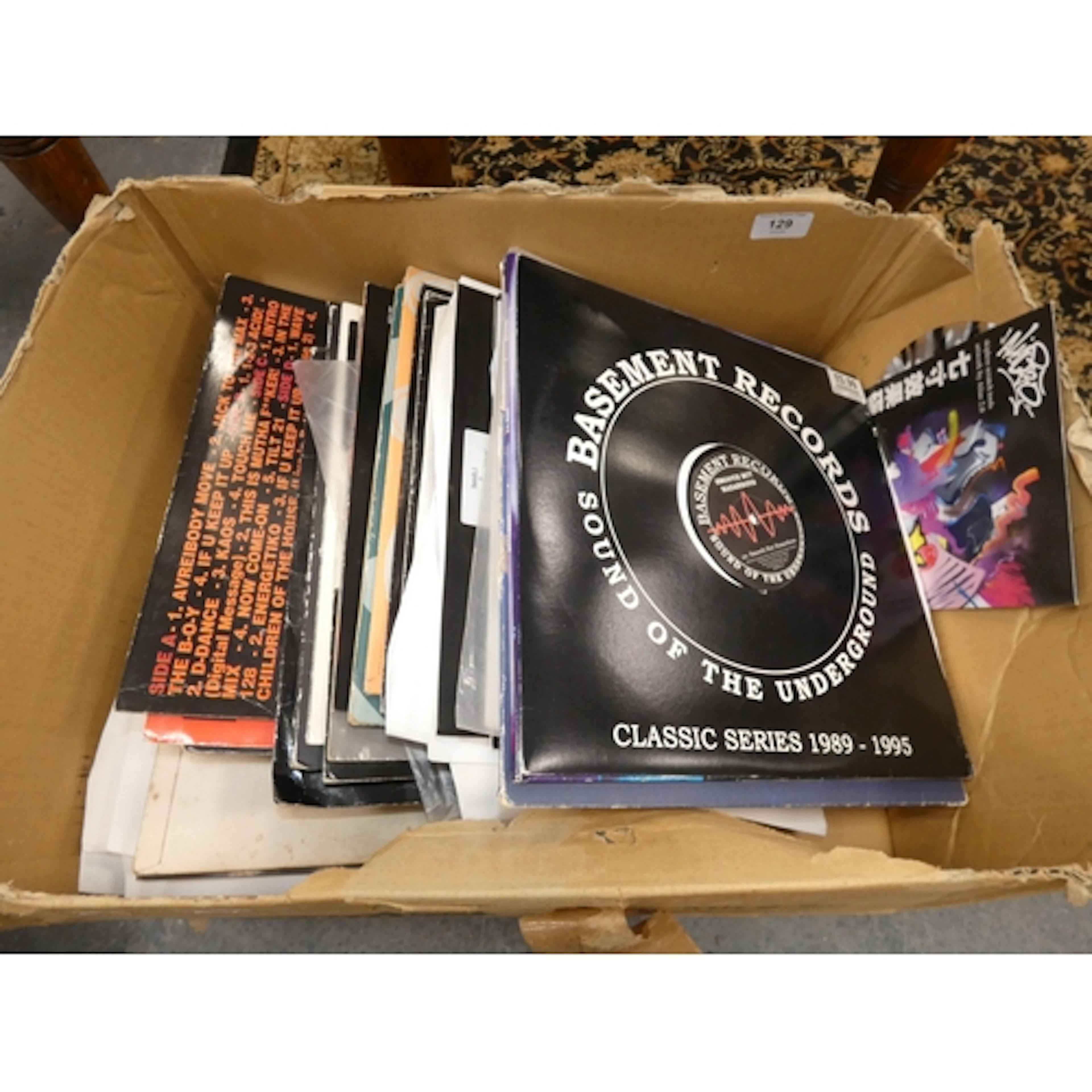 Box of Garage and Hip-Hop vinyl records.