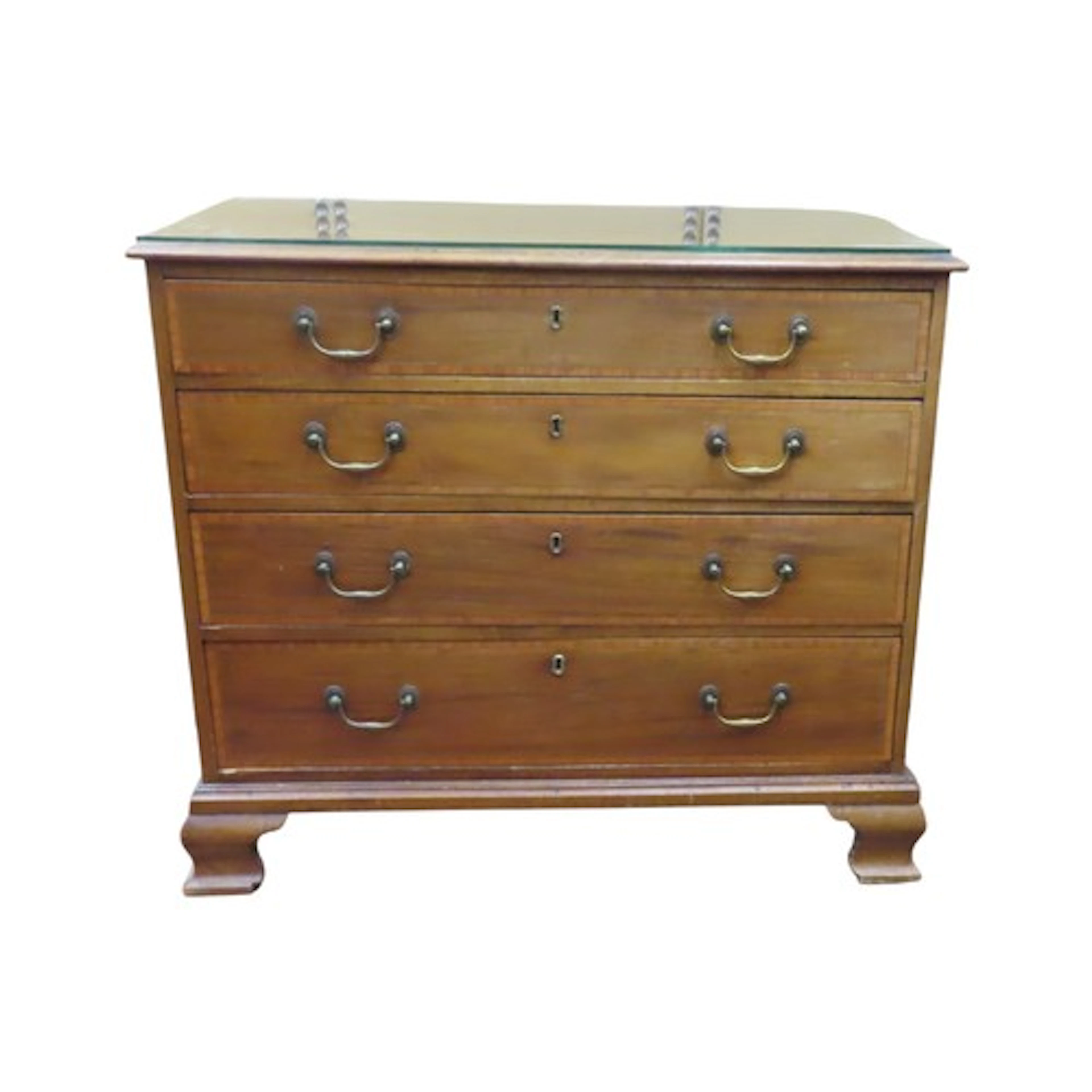 A small Edwardian mahogany chest of four long graduated draw...