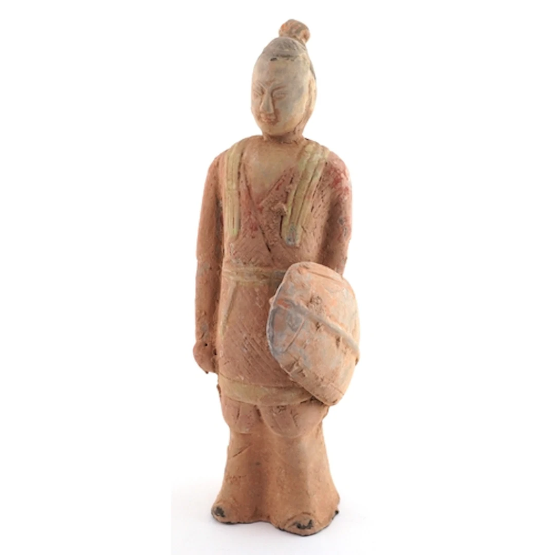 Chinese Han style pottery figurine of a warrior holding a sh...