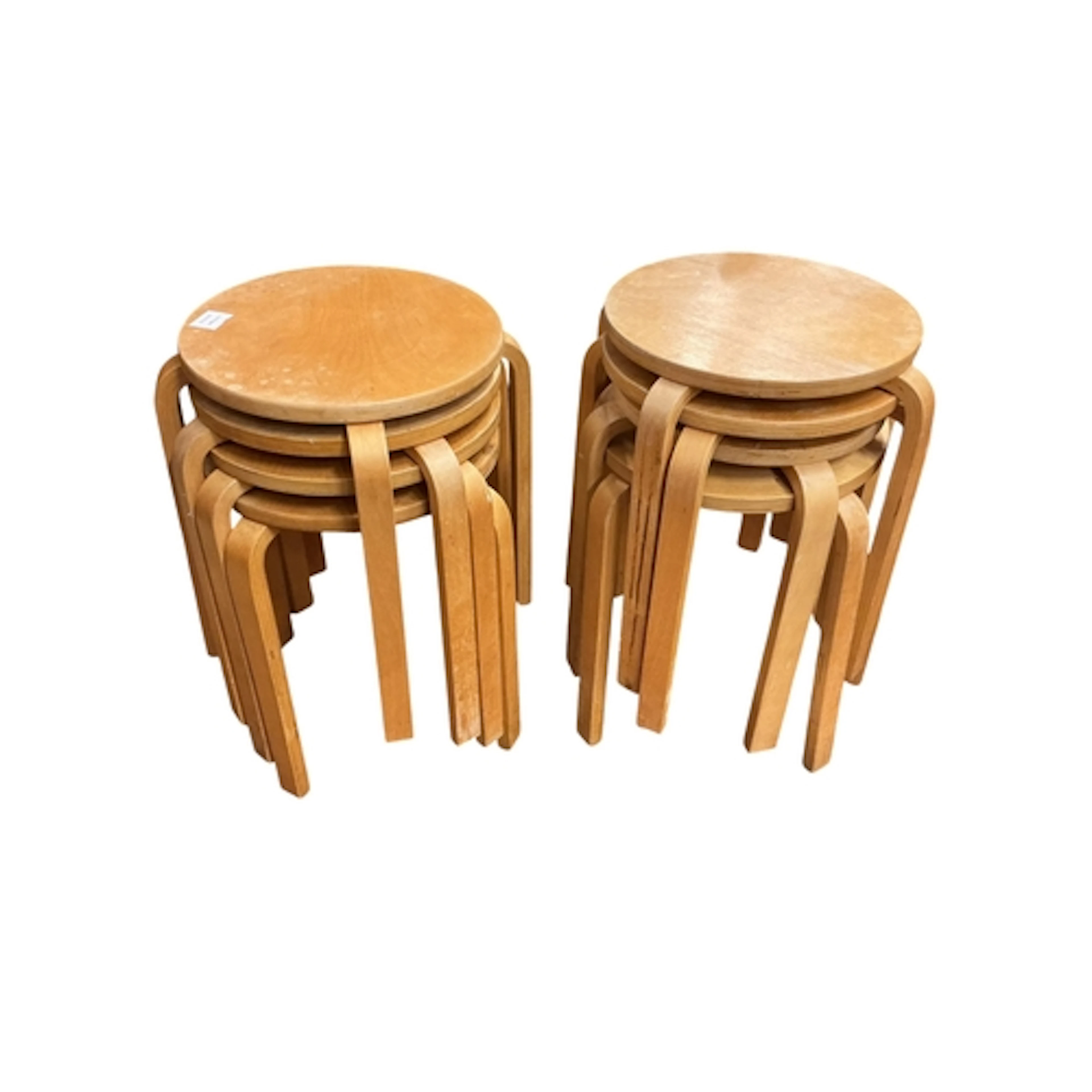 A set of eight Alvar Aalto style bentwood stools, diameter 3...