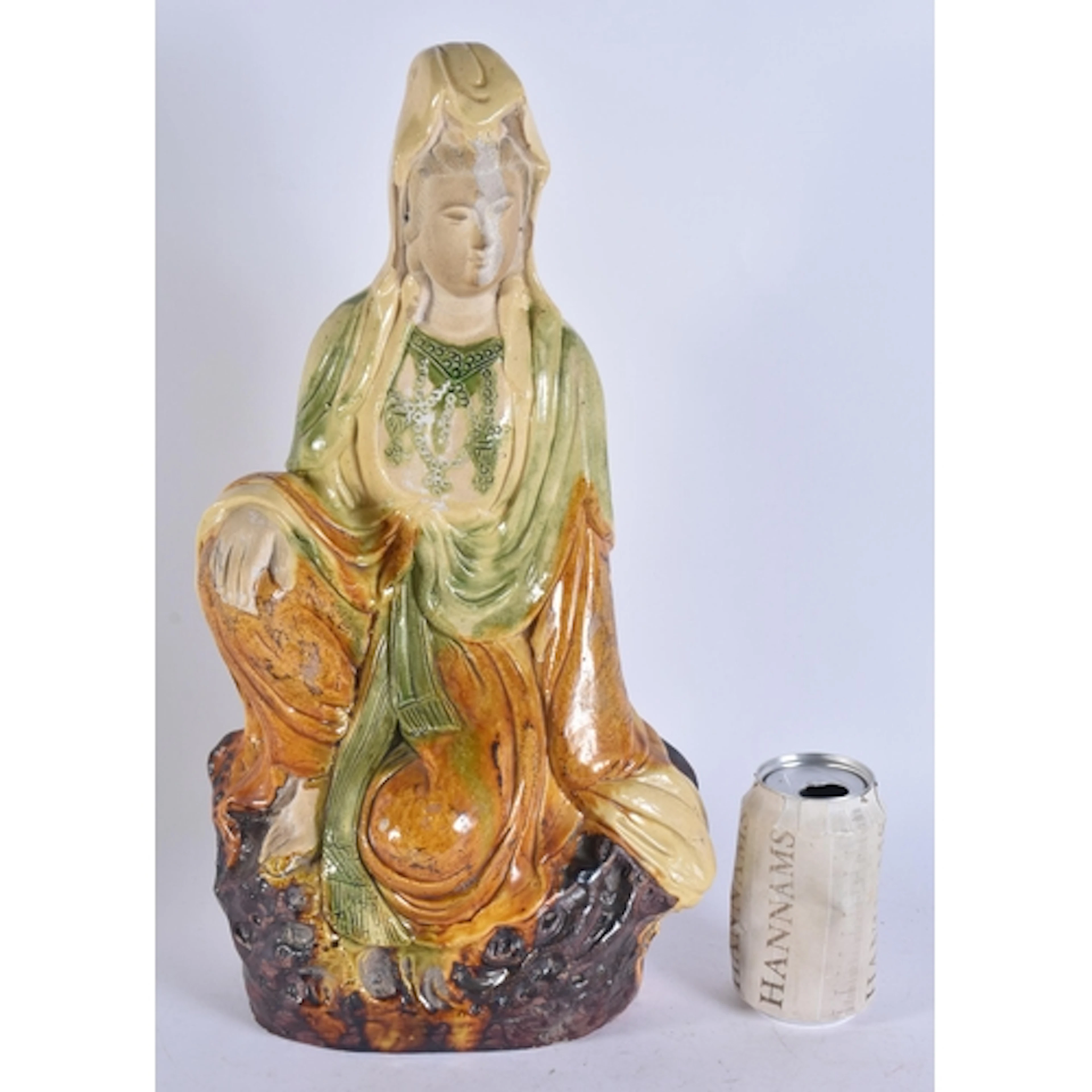 A CHINESE QING DYNASTY SANCAI GLAZED POTTERY IMMORTAL. 41.5 ...