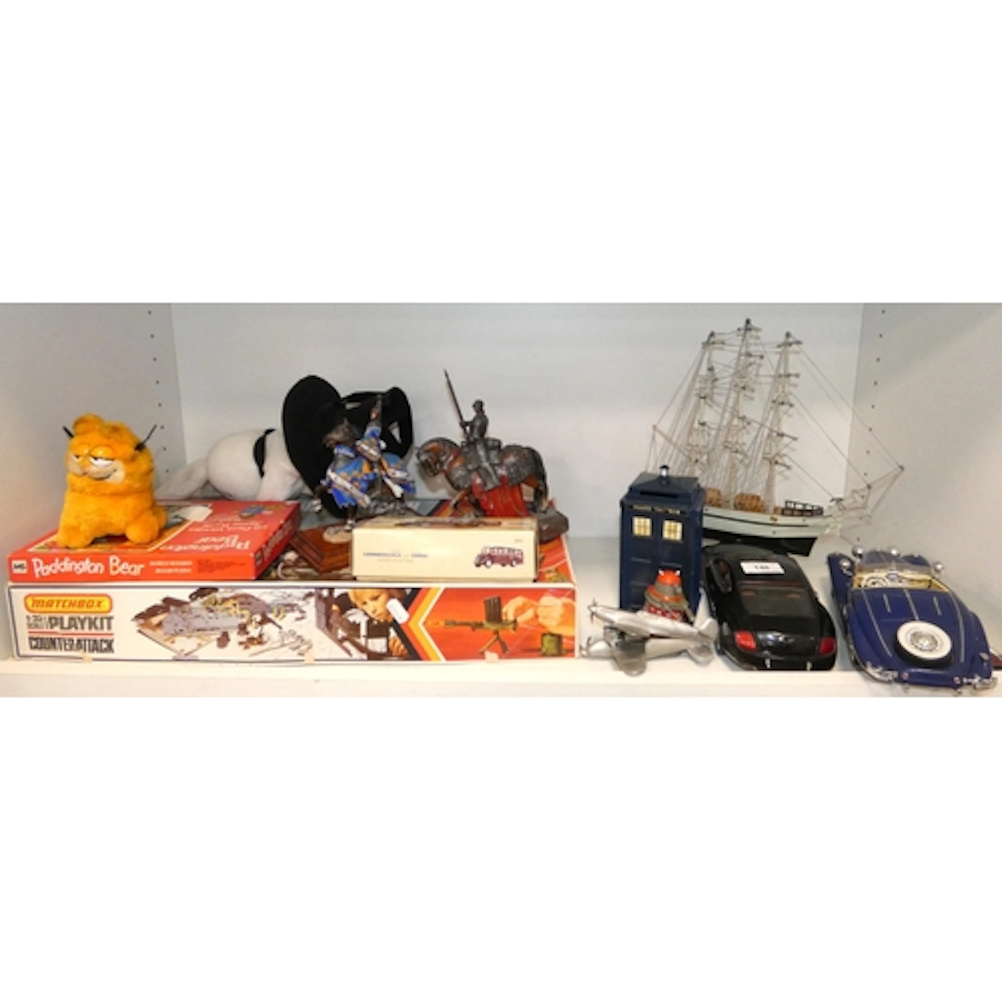 Shelf lot of toys and games to include boxed Corgi 98164 die...
