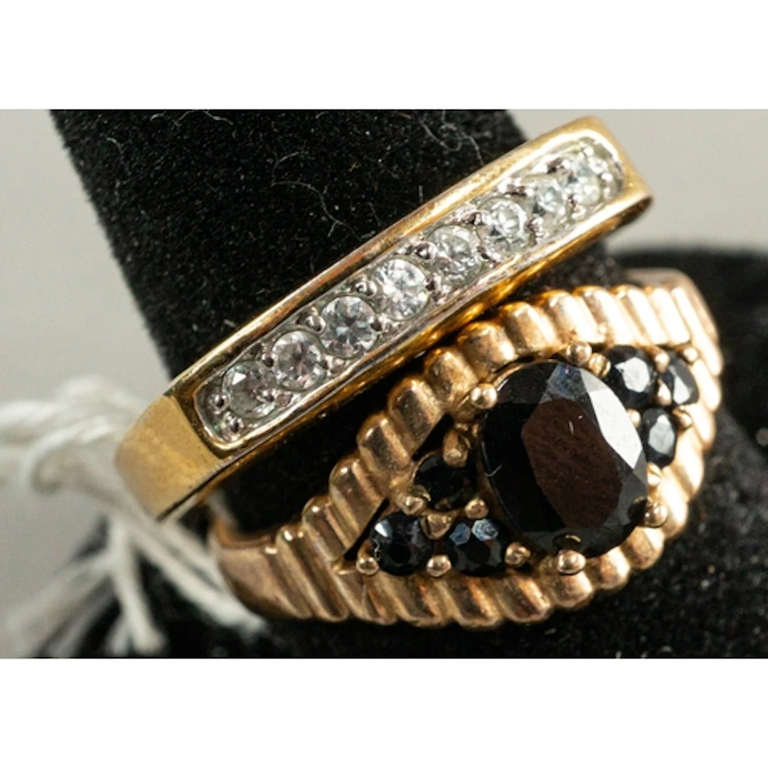 Jewellery: a 9ct yellow gold ring of navette form, a central...