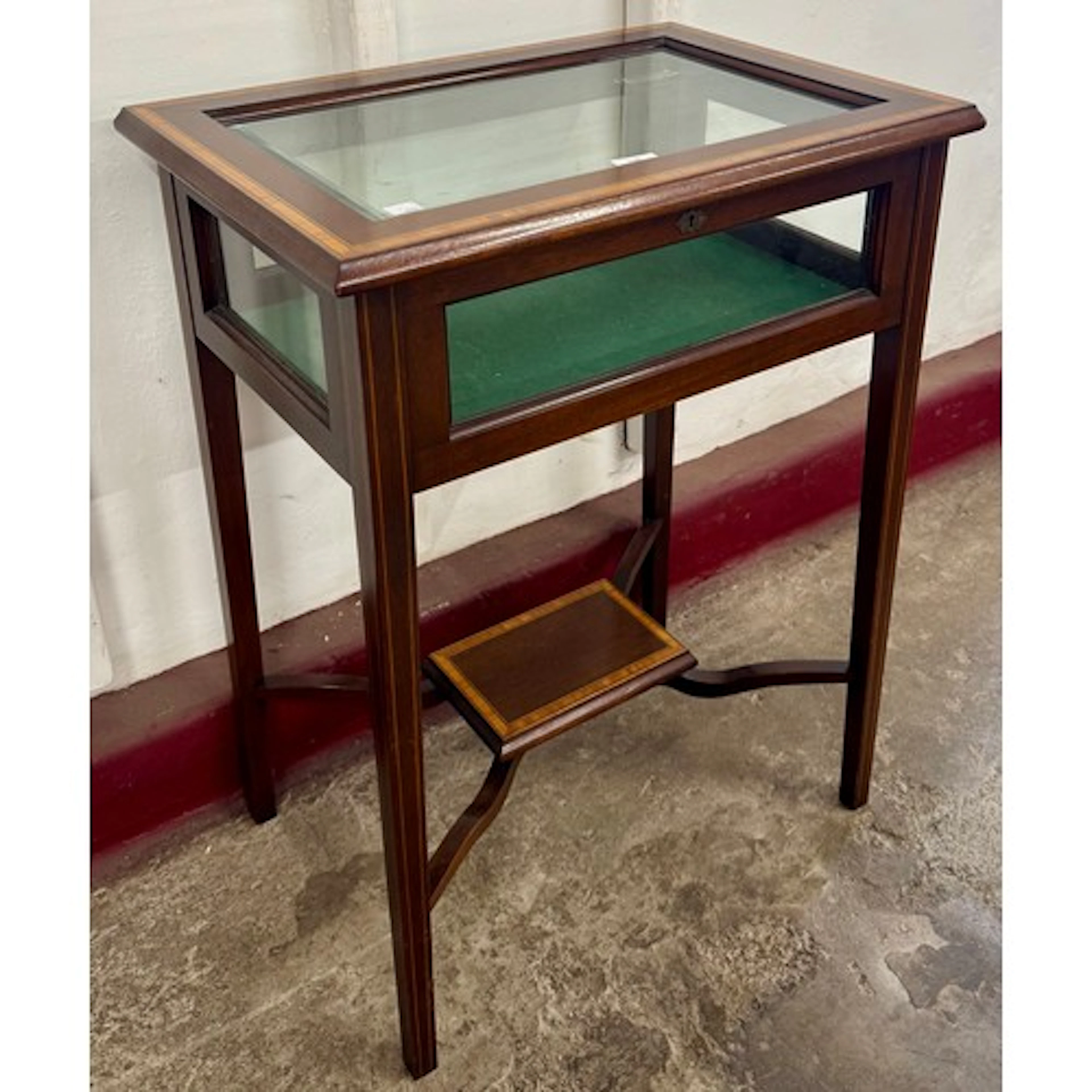 An Edward VII inlaid mahogany bijouterie table