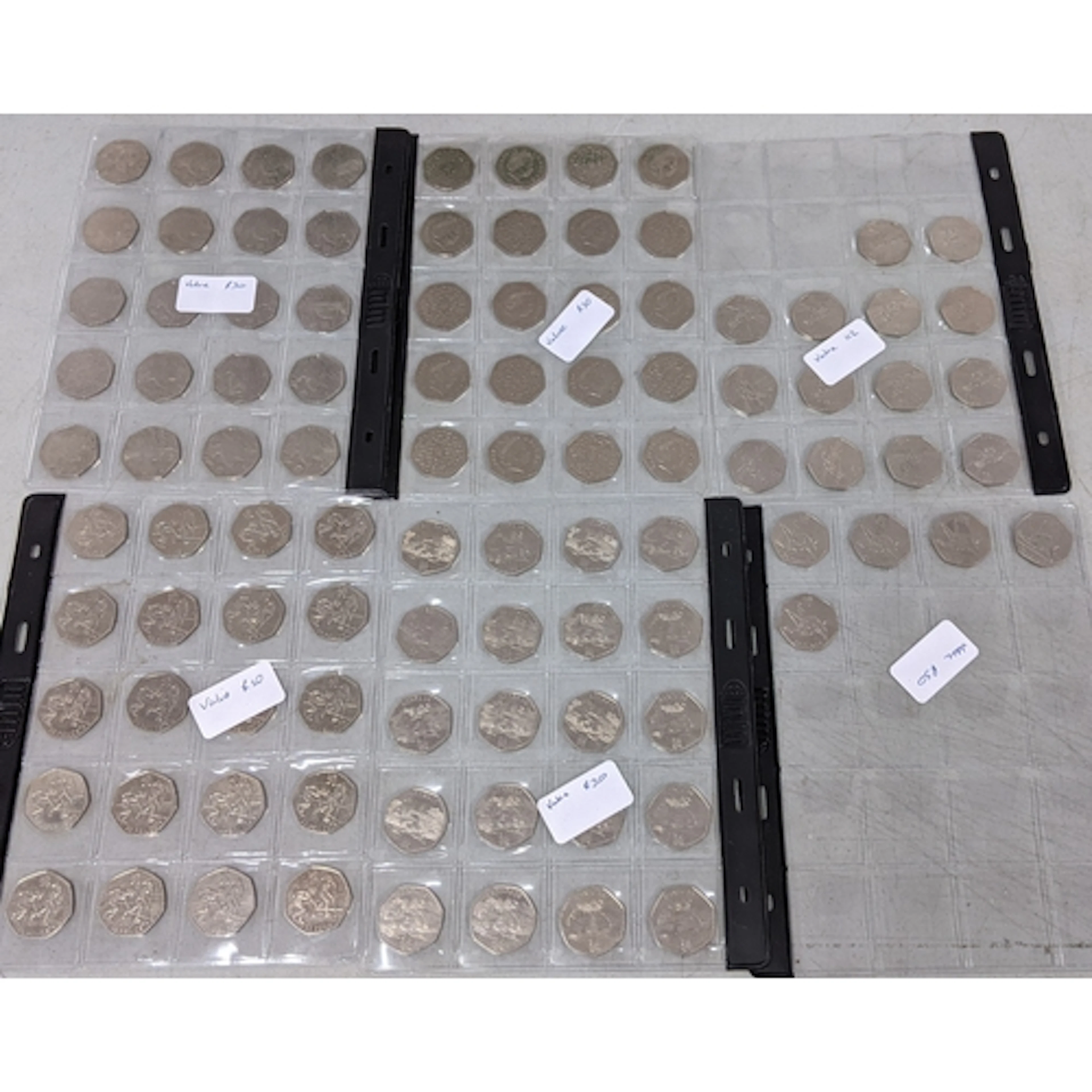 Approximately one hundred 50p coins to include WWF, Hockey, ...