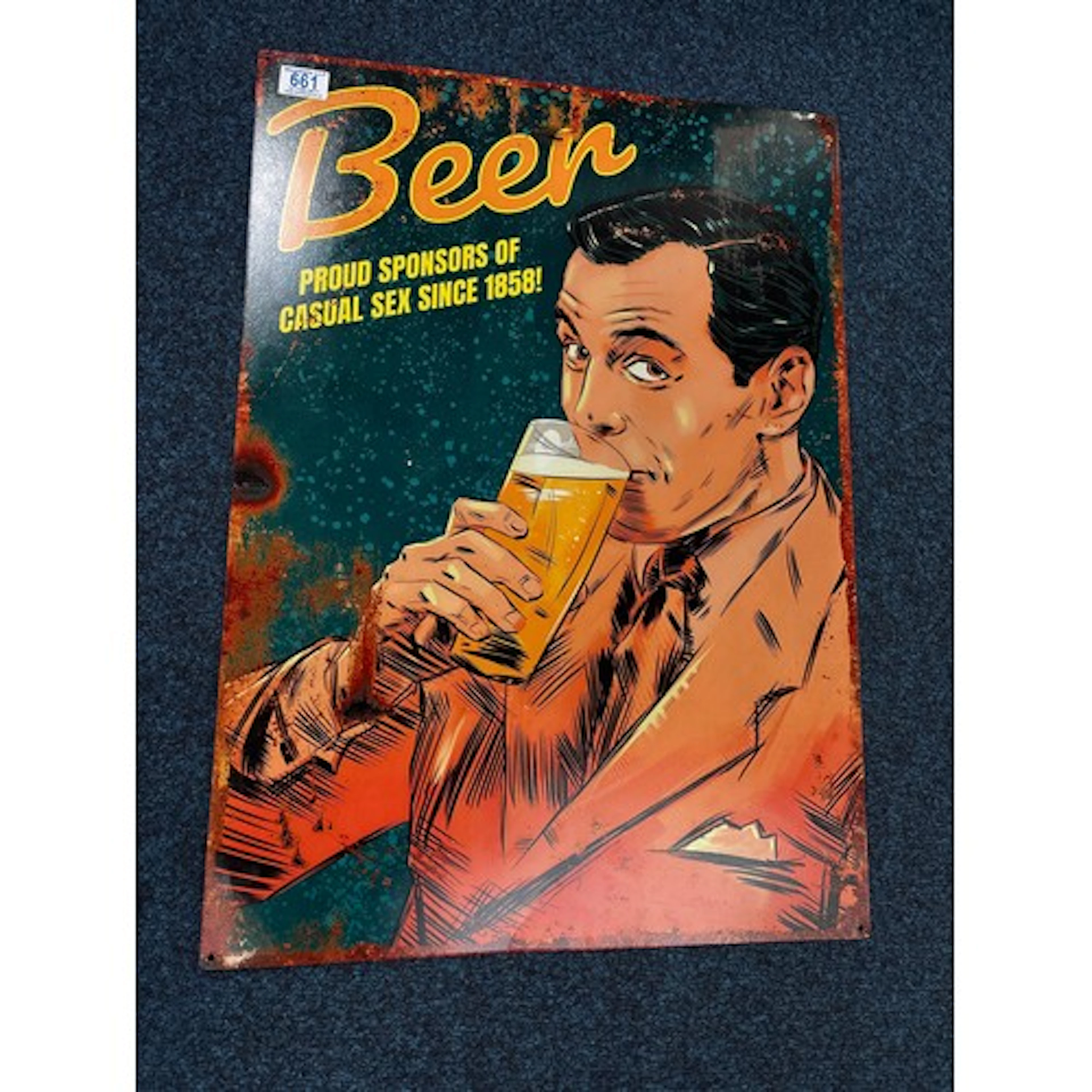 A Beer tin sign