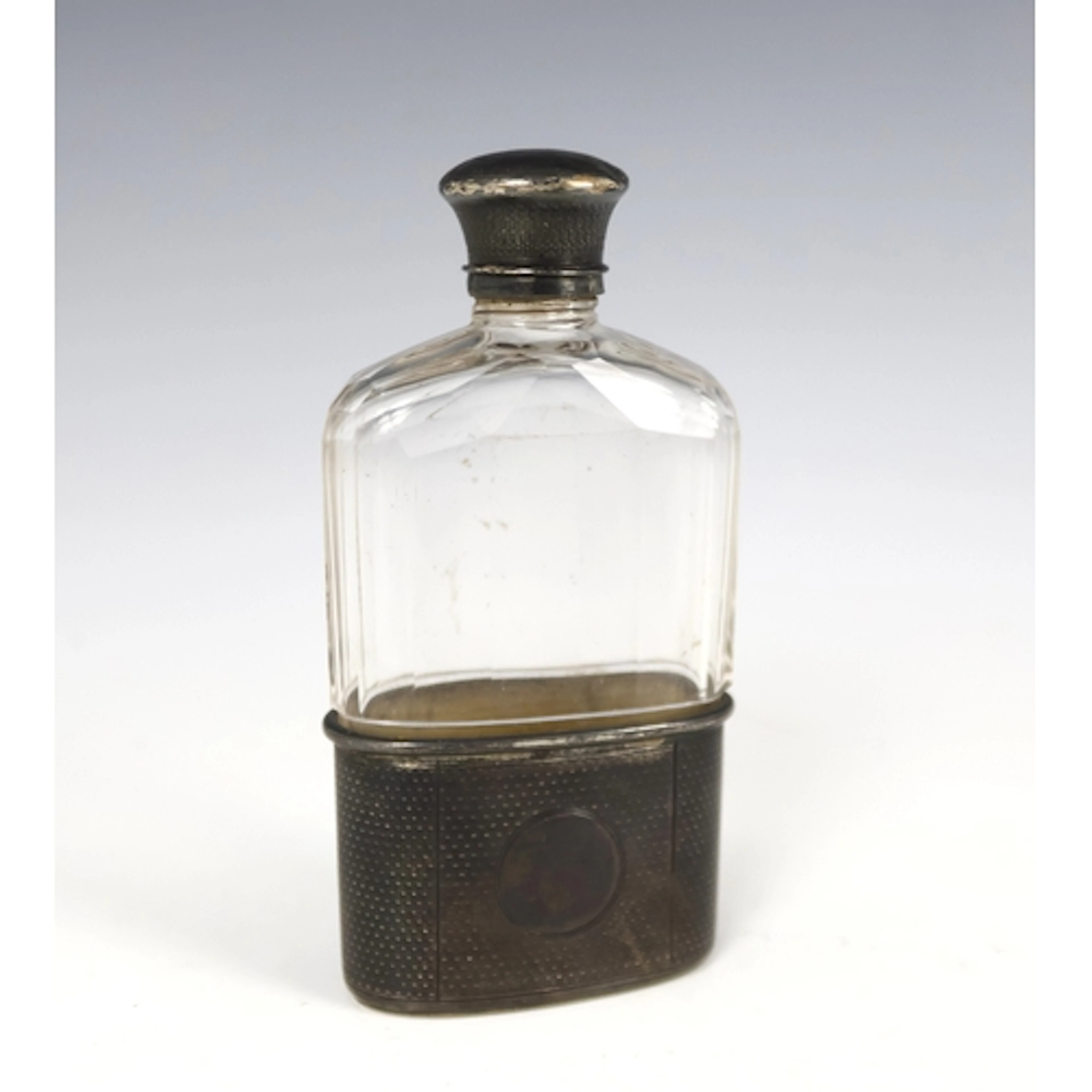 A Victorian silver mounted and glass hipflask, Wright & Davi...