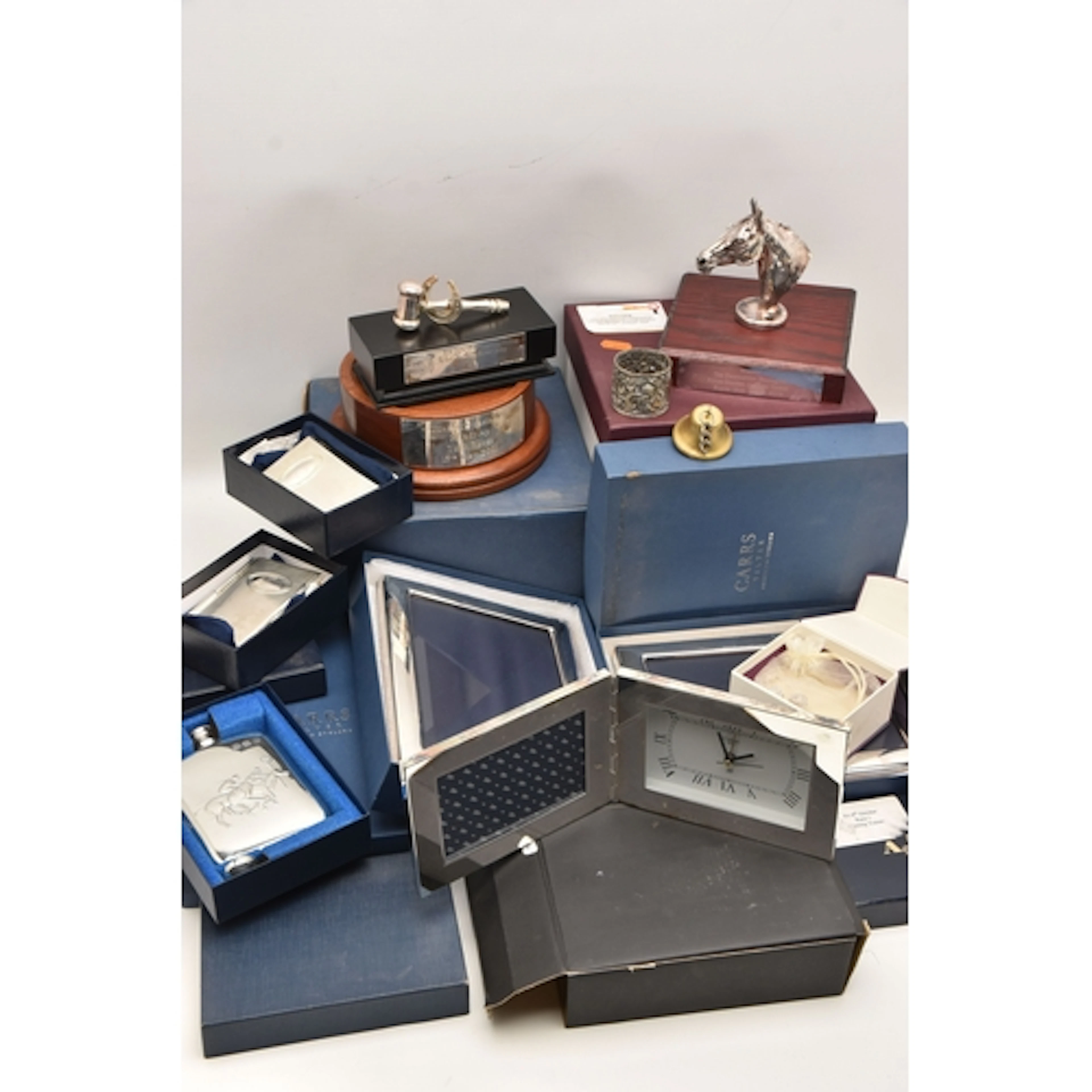 A BOX OF ITEMS, to include silver plated clock and frame, tw...