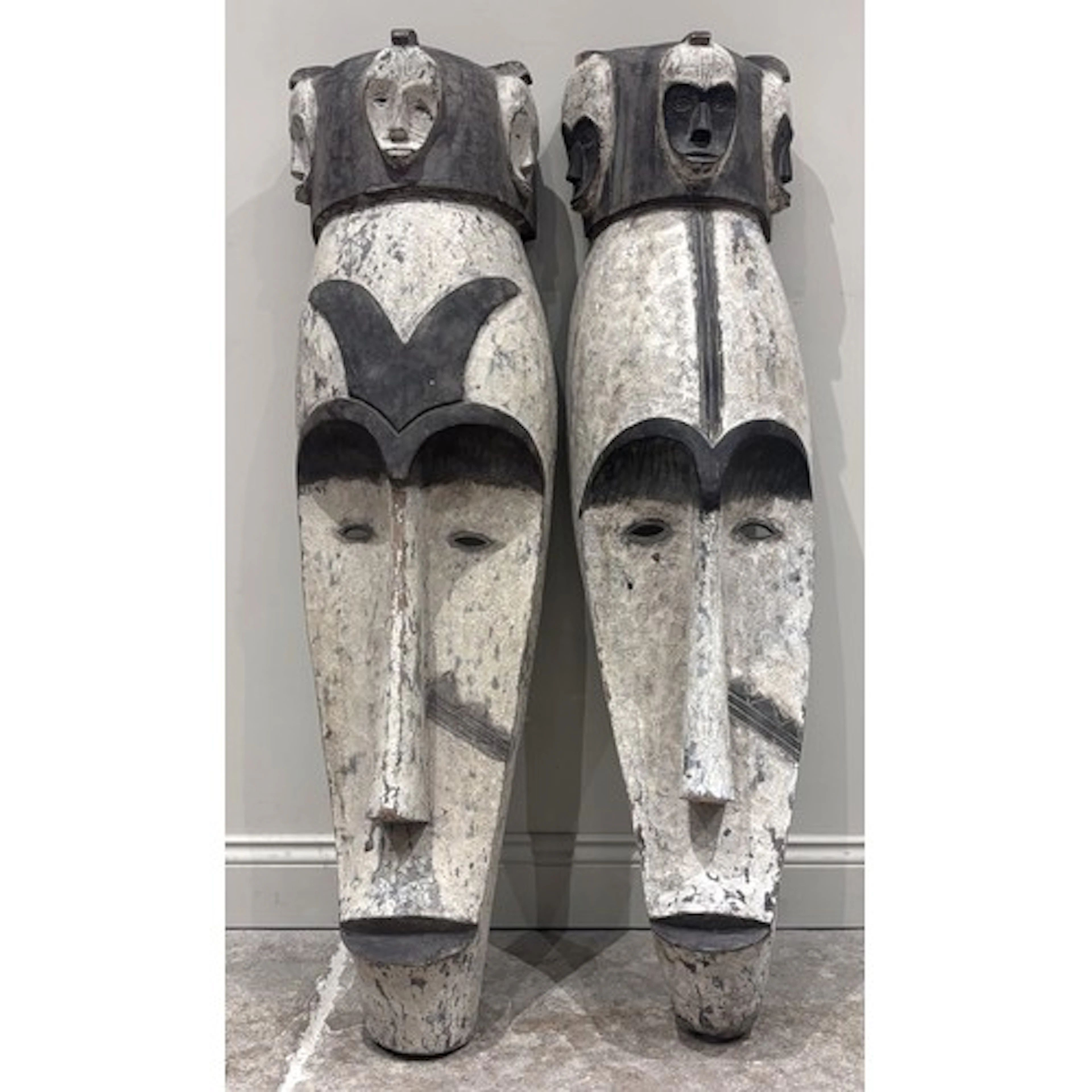 A very large pair of Fang people (Gabon) Ngil masks, each su...